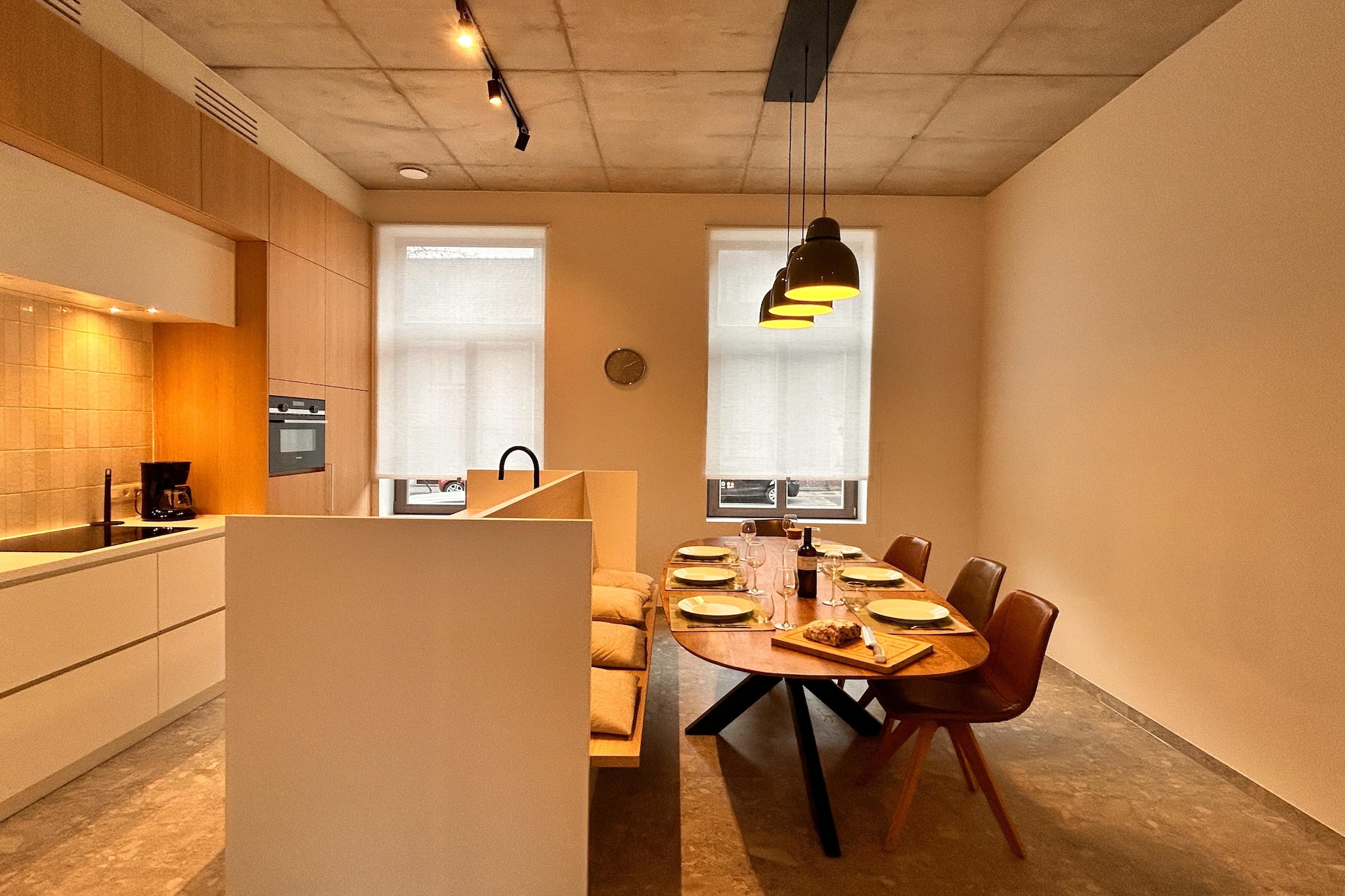 Tucked away in the charming town of Bree, this spacious holiday home offers the perfect blend of comfort, style, and tranquility — a modern retreat designed for families and friends seeking a peaceful escape. Spread across three levels, the home is thoughtfully furnished with contemporary touches and all the essentials needed for a carefree stay. Its bright, all-white interiors and open layout create a soothing atmosphere that instantly makes you feel at ease.

On the ground floor, a cozy living room invites you to relax together — whether you’re watching a movie on the Smart TV or gathering around the dining table for a home-cooked meal. The adjoining open kitchen is fully equipped with an induction hob, combination microwave, dishwasher, and fridge-freezer, making meal prep effortless and enjoyable. A convenient guest toilet is also located on this floor. The upper levels are designed for restful nights. The first floor features two twin bedrooms, a modern bathroom with a shower, and a separate toilet, while the top floor hosts a double bedroom (convertible into two singles) and a cheerful bunk room, perfect for kids. Another sleek bathroom and toilet complete the upper level. Outside, unwind on the private terrace or enjoy the fresh air in the peaceful garden — ideal for morning coffee or evening chats under the stars.

Located in the heart of Limburg, Bree is known for its welcoming atmosphere, cycling routes, and local charm. Explore the nearby Dierentuin Zwartberg Zoo, visit the scenic Bosland forests, or spend an afternoon in the historic city of Hasselt, just 30 minutes away. The nearby Maasmechelen Village outlet and nature reserves along the Meuse River offer even more to discover. This modern home is a serene base for exploring the beauty and culture of Belgium’s greenest province.