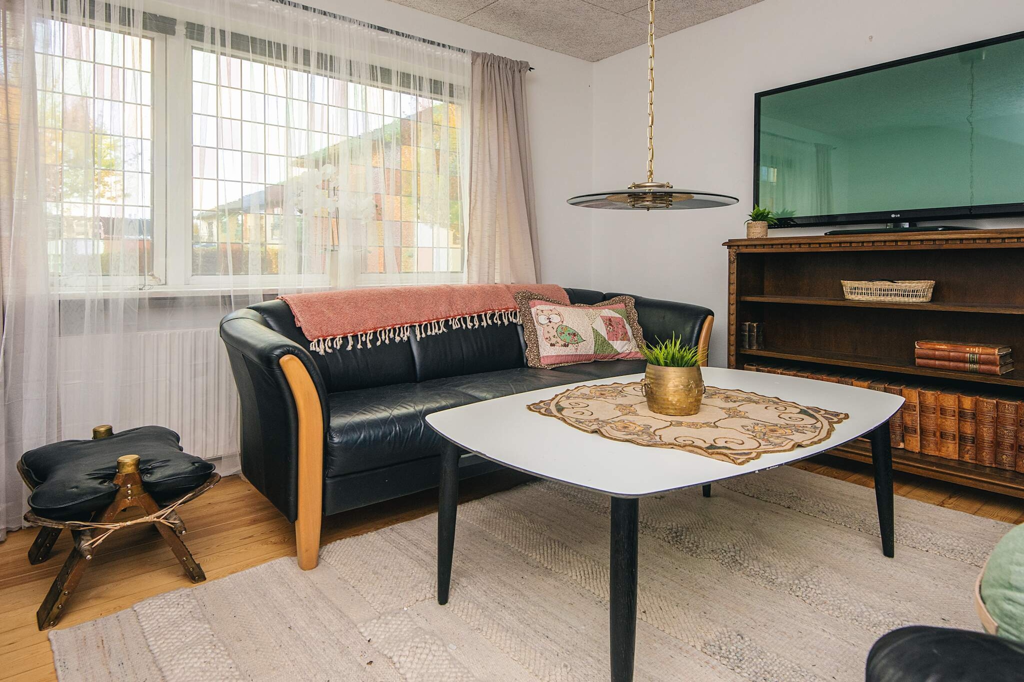 This spacious 172 m² holiday home is ideal for large families or groups who want to spend a comfortable and relaxing vacation near both the sea and the city. Located in a pleasant town area on a 646 m² enclosed plot with trees, the house offers plenty of privacy and outdoor space to enjoy. The property features multiple terraces, including a sunny courtyard and a covered area furnished with garden furniture, perfect for outdoor dining and long summer evenings. Inside, the house is designed for convenience and togetherness. The large living room provides a cozy space for relaxation and social gatherings, with ample seating for everyone. The well-equipped kitchen includes electric hotplates, a dishwasher, and a coffee maker, making meal preparation easy and enjoyable for larger groups. With five comfortable bedrooms, the home offers flexible sleeping arrangements for up to 12 guests. The sleeping options include double beds, single beds, and extra sleeping spaces suitable for children or additional guests. Two bathrooms, each with a shower, toilet, and washbasin, ensure comfort and practicality during your stay. The property is heated by district heating and is non-smoking. The nearby area offers many opportunities for recreation—just 65 meters away you’ll find a grocery store, while the nearest town center is 143 meters away. A restaurant is located 7 km from the house, and a golf course is about 9 km away. Whether you prefer relaxing on the terrace, exploring the local surroundings, or enjoying a seaside outing just 5.8 km away, this house provides the perfect setting for a memorable Danish holiday.A refundable deposit might be charged closer to your check-in date. The security deposit ensures a smooth stay and covers any additional services or consumption charges.This deposit covers utilities consumed during your stay and any additional services that may be taken.The final amount will be adjusted based on actual meter readings, actual usage of extra services, and any remaining balance will be refunded within 21 days after checkout.This deposit simply acts as a prepayment for charges that  you would anyways pay for, ensuring a seamless stay and check-out experience.