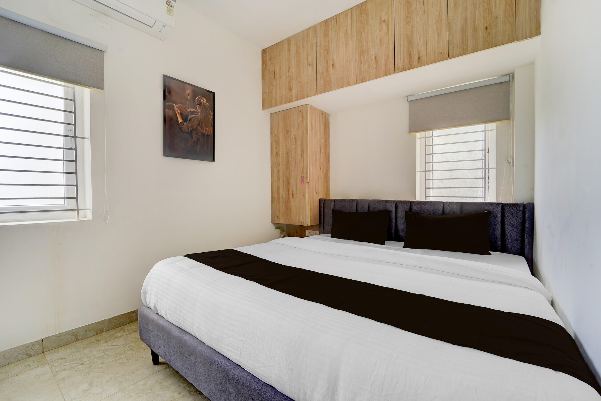 Located close to Coimbatore Airport and surrounded by popular hubs like Prozone Mall, IT parks, medical centers, and nightlife spots such as Rocks the Bar and Mufassa, this premium apartment offers the perfect blend of comfort and convenience for families, groups, and business travellers.
Accommodation
Enjoy the comfort of a 2BHK apartment designed for a homely yet premium stay. With two queen-sized bedrooms, private bathrooms, a spacious living room, and a fully equipped kitchen, the apartment ensures a relaxed and hassle-free experience.
Villa Amenities
✔ Indoor games (Billiards, Table Tennis, Carrom, Darts, Football table, Ice Hockey table)
✔ Children’s play area & park
✔ LED TV (55â€)
✔ Coffee/Tea maker
✔ Refrigerator & RO Purifier
✔ Modular Kitchen (with toaster, stove, cutlery & crockery)
✔ Geyser & Toiletries
✔ Projector & Home Theatre
✔ High-speed Wi-Fi
✔ Parking
Bedrooms
• Bedroom 1: Queen-sized bed | Ensuite bathroom | AC | Fan | Wardrobe space | Work/study desk | Sofa chair
• Bedroom 2: Queen-sized bed | AC | Fan | Wardrobe space | Work/study desk | Sofa chair
Bathrooms
Each ensuite bathroom is equipped with:
🚿 Shower | Geyser | Hand jet spray | Organic toiletries & towels | Western commode
Living & Dining
• Living Room: Sofa seating with a center table | 55†TV | AC | Fans
Kitchen
A fully equipped open kitchen with ample storage space and all necessary appliances: Refrigerator | Oven | Kettle | Stove | Cooking utensils
Dine
🴠The villa comes with a fully equipped kitchen, giving you the flexibility to prepare both vegetarian and non-vegetarian meals.
Nearby Attractions
• Isha Yoga
• Coimbatore Airport
• Prozone Mall
• Medical Hub (KMCH, PSG, Ramakrishna, Kumaran Hospital)
• Saravanampatti IT & TIDEL Park
• Rocks the Bar & Mufassa