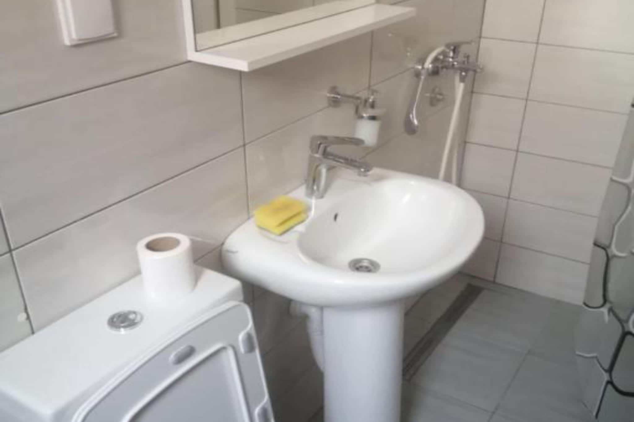 Seaside Serenity – Fresh & Modern Apartments in Igalo - One Bedroom Apartment 4-Badkamer