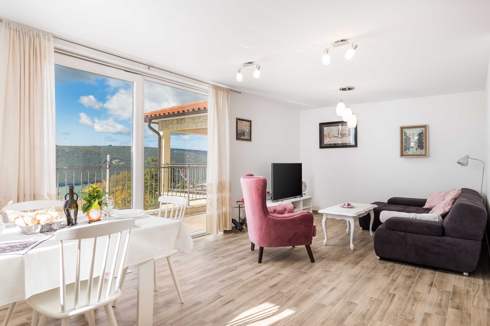 The Wonderful Labin Villa, located in Labin, Istria County, Croatia, is a beautiful vacation rental that offers a serene getaway with stunning views of the sea. Here are some key features and highlights of the villa:A charming historical town situated on a hill overlooking the Adriatic Sea. Labin is known for its medieval architecture, cobblestone streets, and vibrant cultural scene.The villa provides magnificent views of the Adriatic and is often just a short drive from various beaches.
Notes:
Private parking reservation not required.
Baggage drop-off is available before check-in.
Wi-Fi is available throughout the property.
Pets are not allowed.
This three -bedroom can accommodate up to six guests. It features a TV and is combined with a living room and kitchen. The private bathroom is equipped with a shower and toilet.
Thanks to its excellent location, everything you'll need for your vacation is just a short walk away from the property. Grocery stores, cafes, restaurants—everything is within a 1.40 km radius. The beach is 400 m away from the property.
The airport is 26.5 km away from the property.