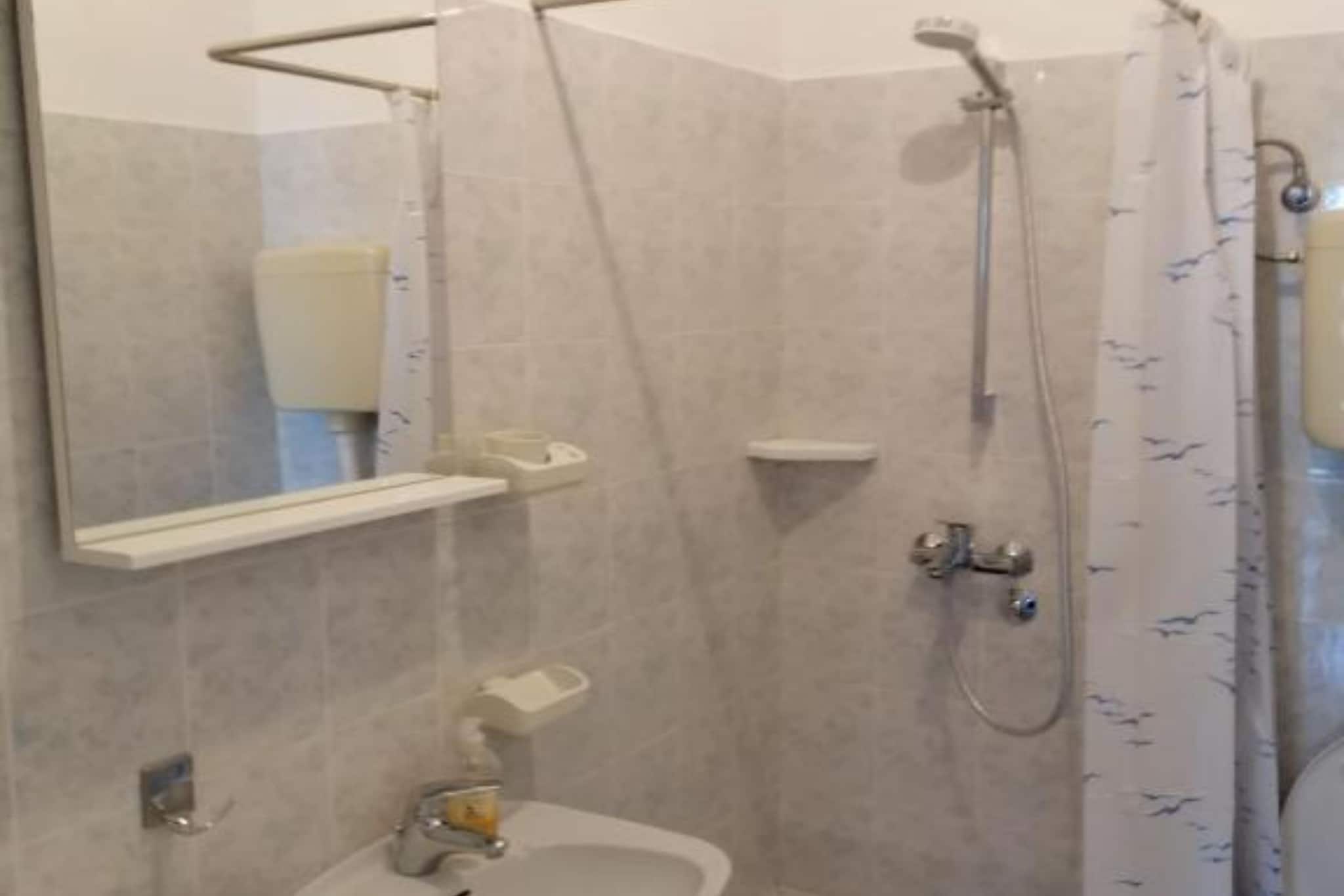Spacious and Cozy Seafront Apartments - Two Bedroom Apartment  with Terrace and Sea View-Bathroom