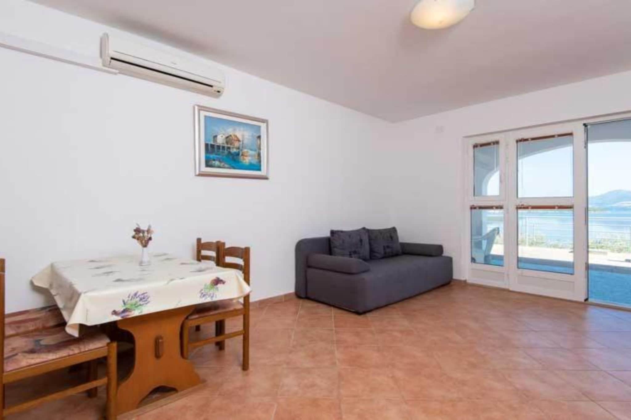 Spacious and Cozy Seafront Apartments - One Bedroom Apartment with Terrace and Sea View