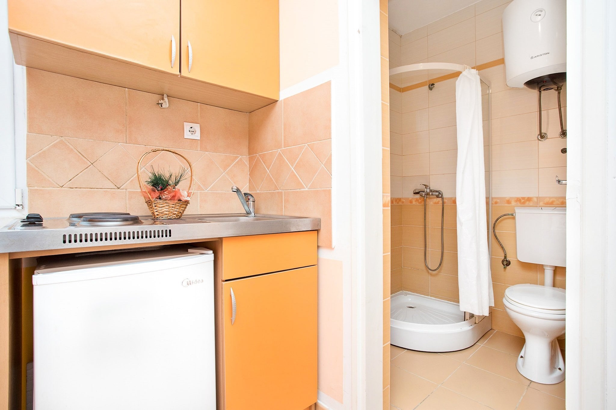 Perfect Budva Stay Near the Sea & Aqua Park is a popular attraction featuring numerous water slides, pools, and entertainment options suitable for all ages. It's located on Topliš Hill, offering panoramic views of the surrounding area. The park is typically open during the summer, providing visitors with a refreshing escape.
When planning your stay, consider the proximity of accommodations to both the beach and Aqua Park Budva to maximize your convenience and enjoyment. Budva, a picturesque coastal town in Montenegro, offers a variety of accommodations near the sea and the popular Aqua Park Budva.
Note:
Private parking is available, reservation is not required.
Baggage drop-off is available before check-in.
Wi-Fi is available throughout the property.
Pets are not allowed.
This studio apartment can accommodate up to three guests. It features a cable TV and is combined with a kitchen. The private bathroom is equipped with a shower.
Thanks to its excellent location, everything you'll need for your vacation is just a short walk from the property. Grocery stores, cafes, restaurants—everything is within a 5.0 km radius. The beach is 900 m away from the property.
The airport is 16 km away from the property.