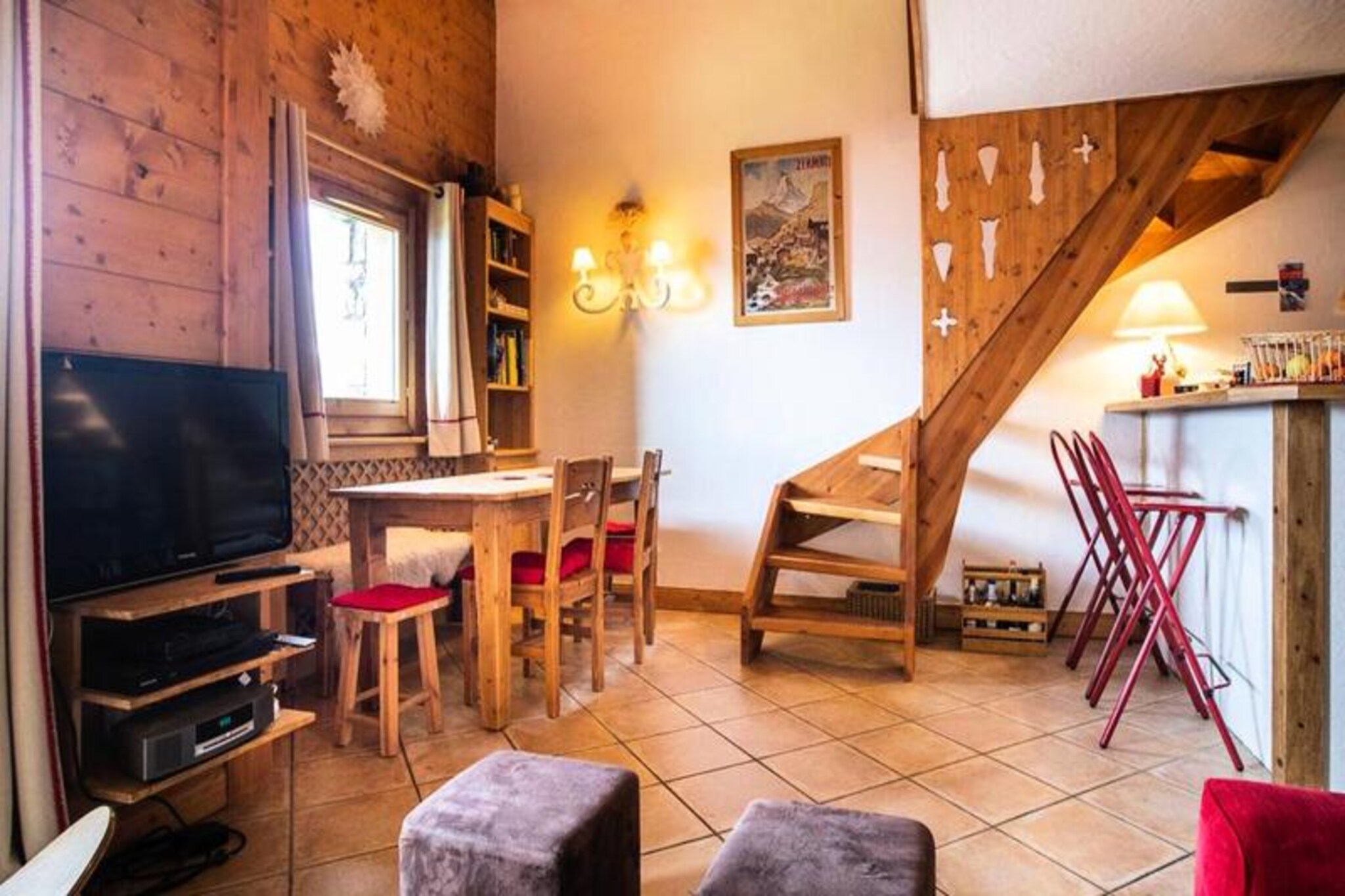 Perched in the serene village of Le Chantel, this spacious 70m² duplex invites you to experience the magic of the French Alps with breathtaking views of Mont Blanc from its west-facing balcony. The residence Le St Bernard offers direct access to the slopes, making it a dream destination for ski enthusiasts. Whether you're seeking thrilling adventures or tranquil moments, this property is your gateway to an unforgettable mountain escape. \n\nDesigned to accommodate up to eight guests, the duplex features three comfortable bedrooms spread across two floors. The ground floor boasts a cozy living room with sofas, armchairs, TV, and Wi-Fi, alongside a fully equipped kitchen with modern appliances including a Nespresso coffee machine and dishwasher. Upstairs, you'll find a luxurious bathroom, an en-suite bedroom, and a charming bunk room perfect for families. Additional amenities such as covered parking, a ski locker, and included essentials like towels and linens ensure a hassle-free stay. \n\nLocated just minutes from the Charvet/Villards resort, the ESF ski school, and local shops, this residence combines convenience with tranquility. Free inter-resort shuttles and the Dahu gondola make exploring the area effortless. After a day on the slopes, unwind in the neighboring Iseran residence’s relaxation area, complete with an indoor pool and solarium. \n\nWhether you’re visiting for winter sports in Paradiski’s 425 km of slopes or summer hikes in the legendary Vanoise National Park, Les Arcs offers a unique blend of natural beauty and vibrant alpine life. This is more than a holiday home—it’s your gateway to the charm and adventure of the mountains.