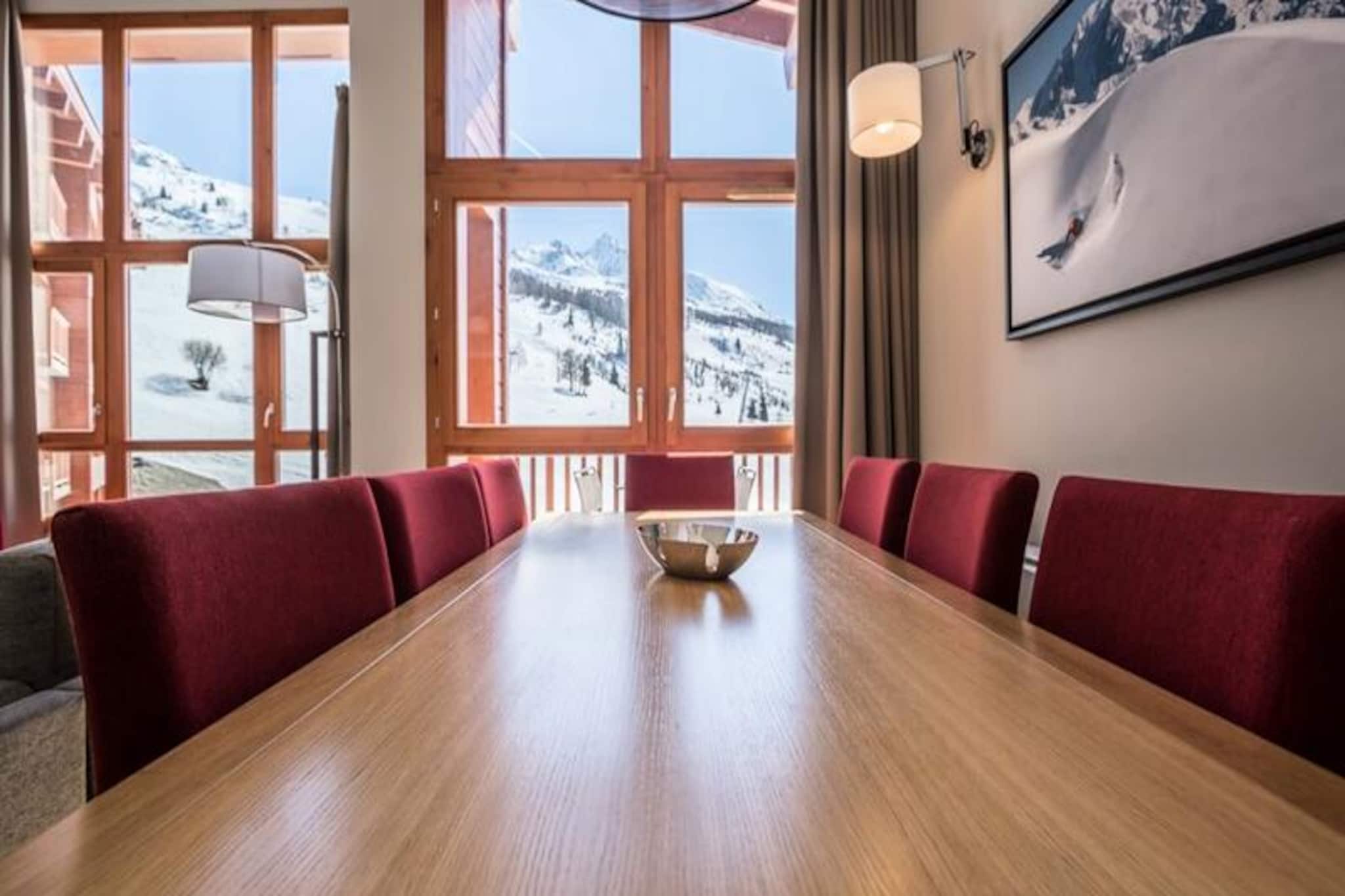 High above the breathtaking Tarentaise Valley, this luxurious 4-star residence in Arc 1800 offers a perfect blend of modern comfort and alpine charm. With panoramic southwest views from your private balcony, every moment becomes a postcard-worthy memory. Whether you're here for winter skiing or summer golfing, the premium Les Monarques residence ensures an unforgettable stay with ski-in/ski-out access and proximity to the renowned Paradiski area. The serene mountain setting is complemented by exceptional amenities, including a swimming pool, spa, and fitness room, providing relaxation after a day of adventure. \n\nThis spacious 5-room apartment spans 110 square meters and comfortably accommodates up to nine guests. The elegant interiors feature a cozy living room, a fully equipped open kitchen, and four beautifully appointed bedrooms, including one with an en-suite shower and WC. Modern conveniences such as Wi-Fi, a Bose Hi-Fi system, and covered parking ensure a seamless experience. The thoughtful inclusions like beds made upon arrival, towels, and end-of-stay cleaning make your stay even more hassle-free. \n\nLocated in the prestigious Edenarc au Chantel area, the residence is just minutes from Nama Springs Spa, gourmet shops, and the Dahu cable car, which connects you to the Arc 1800 snow front in under three minutes. In summer, the nearby golf course and hiking trails offer endless opportunities for outdoor exploration. The free shuttle bus stop ensures easy access to the resort center and its lively restaurants, shops, and après-ski venues. \n\nWhether you're seeking thrilling ski slopes, tranquil nature walks, or indulgent spa moments, this property is your gateway to the best of the French Alps. Create lasting memories in a setting that combines luxury, convenience, and the timeless beauty of the mountains.