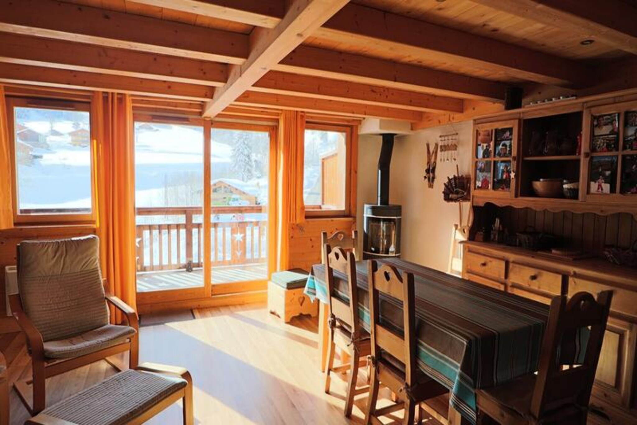 High above the picturesque slopes of the Planay ski area, this charming duplex on the top floor of a cozy three-story residence invites you to experience the perfect alpine getaway. With direct ski-in/ski-out access to the connecting slope leading to the Arèches ski area, your winter adventures begin just steps from your door. The Cuvy gondola lift is only a two-minute glide away, making it effortless to explore the pristine trails and breathtaking vistas of this renowned region. Whether you're here for skiing, snowboarding, or simply soaking in the tranquil beauty of the mountains, this property offers an idyllic retreat for all seasons. \n\nInside, the duplex is thoughtfully designed to combine comfort and practicality. The entrance hall opens into a bright and spacious living room, where large windows frame stunning mountain views. A south-facing terrace provides the perfect spot for morning coffee or evening stargazing. The living room is equipped for relaxation, with cozy seating for reading, playing games, or watching TV. The dining area features a large family table, ideal for sharing meals prepared in the fully equipped kitchen, complete with a ceramic hob, electric oven, microwave, Nespresso coffee machine, soda machine, and dishwasher. Upstairs, the sleeping arrangements cater to families and groups, with beautifully appointed bedrooms and two bathrooms. Additional amenities include a laundry room, secure garage, ski room, and bike storage. \n\nBeyond the property, the surrounding area is a haven for outdoor enthusiasts. From thrilling ski runs to scenic hiking trails, there’s no shortage of activities to enjoy. The nearby village of Arèches offers charming shops, local restaurants, and a welcoming atmosphere that captures the essence of alpine living. Whether you’re seeking adventure or relaxation, this duplex provides the perfect base for creating unforgettable memories in the French Alps.