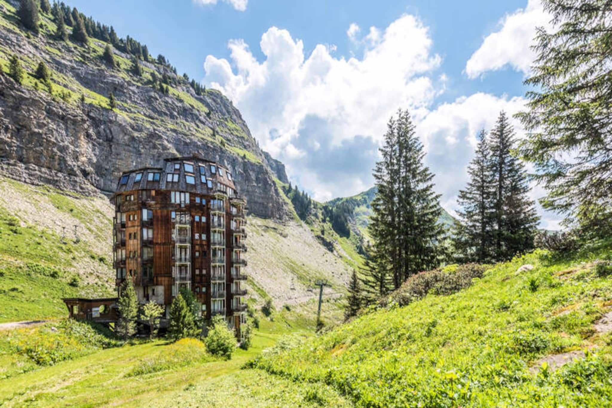 High above the picturesque Haute-Savoie region, this charming studio in the Les Ruches district of Avoriaz offers an unbeatable alpine escape. Perched on the 5th floor, it boasts direct ski-in/ski-out access, ensuring you can step right onto the slopes and immerse yourself in the magic of the Portes du Soleil ski area. With its west-facing balcony, you’ll wake up to breathtaking mountain views and enjoy the golden hues of sunset after a day of adventure. The vibrant resort center, brimming with shops, restaurants, and entertainment, is just a short stroll away, making it the perfect base for your mountain getaway. 
 
 Compact yet thoughtfully designed, this 19 m² studio comfortably accommodates up to four guests with a convertible sofa bed in the living area. The semi-open kitchen is equipped with all the essentials for preparing hearty meals to fuel your alpine adventures. After an active day, unwind in the bathroom’s relaxing bathtub or step out onto the balcony to soak in the crisp mountain air. Modern amenities, including a towel dryer and optional baby kits, ensure a comfortable and family-friendly stay. Pets are also welcome, so your furry companions can join in on the fun. 
 
 Avoriaz is a car-free resort, offering a unique and tranquil atmosphere. From your doorstep, explore the vast Portes du Soleil network, renowned for its world-class skiing in winter and scenic hiking and biking trails in summer. Beyond the slopes, enjoy ice skating, horse-drawn sleigh rides, or the Aquariaz water park, perfect for families. The resort’s lively après-ski scene and local Savoyard cuisine provide the ideal way to end each day. 
 
 Whether you’re seeking thrilling outdoor pursuits or a serene mountain retreat, this studio in Avoriaz combines convenience, comfort, and stunning natural beauty for an unforgettable alpine holiday.