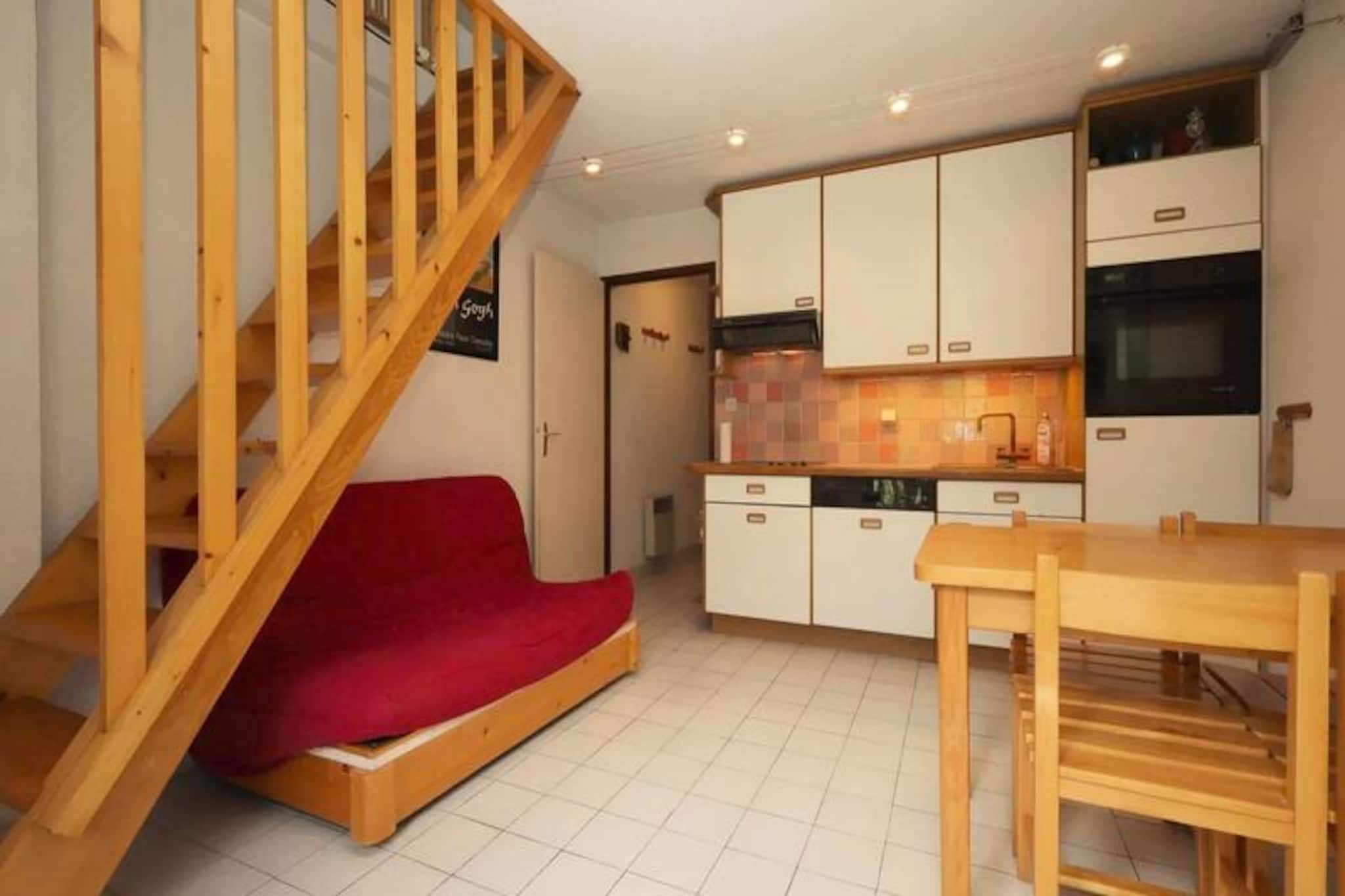 Imagine waking up to the majestic sight of the Mont Blanc massif, its snow-capped peaks glowing in the morning light. This charming duplex apartment in Les Houches offers an idyllic alpine retreat for families or friends seeking both adventure and relaxation. Located just 2.2 km from the Bellevue cable car and 1 km from the village center, you’ll have easy access to restaurants, bars, a bakery, ski shops, and a Carrefour Contact for all your essentials. The southeast-facing balcony provides breathtaking views, making every moment here unforgettable. \n\nSpanning approximately 50 m², this cozy yet spacious apartment accommodates up to six guests. The ground floor features a welcoming living room with a comfortable sofa, television, and dining area. The fully equipped kitchen includes a refrigerator, oven, dishwasher, and electric burners—perfect for preparing hearty meals after a day on the slopes. A sleeping alcove with a single bed and trundle bed, along with a bathroom, completes the lower level. Upstairs, you’ll find two inviting bedrooms—one with twin beds and another with a double bed—as well as a shower room with a washing machine and dryer, plus a separate toilet. \n\nConvenience is key with private parking, a ski locker, and proximity to public transportation and ski slopes. Whether you’re hitting the nearby pistes or exploring the charming village of Les Houches, this apartment is your gateway to alpine bliss. Pets are welcome, so bring along your furry friend to share in the adventure. \n\nWith its stunning views, thoughtful amenities, and prime location, this residence promises a memorable mountain getaway for all seasons.