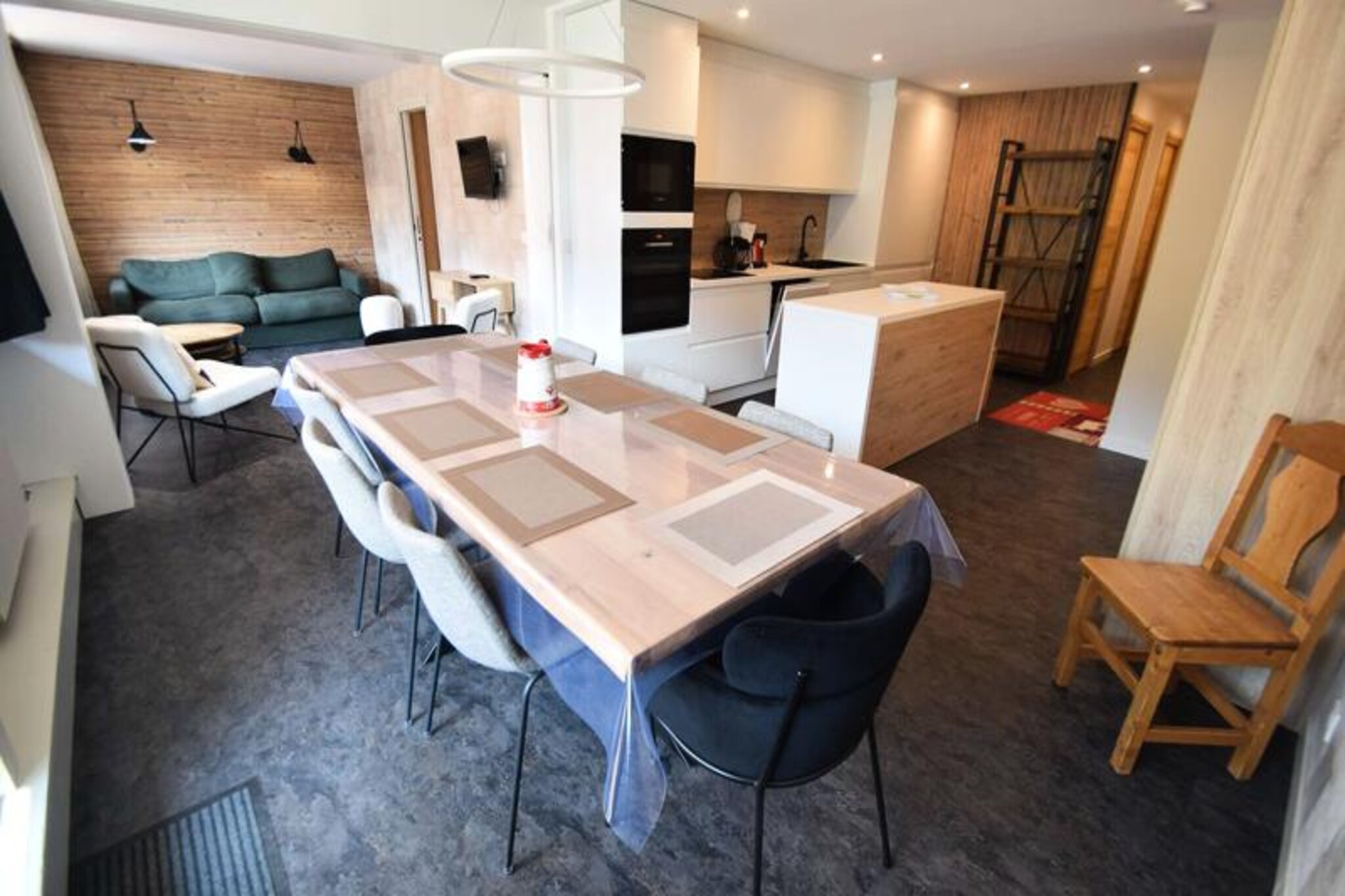 High above the Tarentaise Valley, this spacious apartment in the renowned LE VERCORS residence offers a perfect blend of alpine charm and modern convenience. Imagine waking up to the sunlit slopes of La Plagne, with breathtaking views from your south-facing balconies, and stepping directly onto the pistes for a day of skiing in the world-class Paradiski domain. Whether you're here for winter sports or summer adventures, this property places you at the heart of the action while offering a peaceful retreat to unwind after an active day. \n\nDesigned for up to eight guests, the apartment spans 80m² and features three well-appointed bedrooms, including a cozy double room, a bunk-bed room ideal for families, and a charming double room without windows for added privacy. The open kitchen is equipped with ceramic hobs, a multifunction oven, a dishwasher, and a large refrigerator, making it easy to prepare meals for your group. The living room invites relaxation with its dining area and TV lounge, while two bathrooms and a separate toilet ensure comfort and convenience for all. Additional amenities include a washing machine, dryer, and ski lockers for hassle-free storage. \n\nSituated in the vibrant Plagne Centre, the residence is directly connected to the shopping mall, offering easy access to restaurants, shops, and après-ski activities. Outdoor parking and convenient stair access make arrival and departure seamless. In summer, explore scenic hiking trails, mountain biking routes, and the natural wonders of the Vanoise National Park. \n\nWhether you're seeking thrilling ski days or tranquil alpine escapes, this apartment is your gateway to unforgettable moments in the French Alps. Book your stay and immerse yourself in the beauty and excitement of La Plagne.