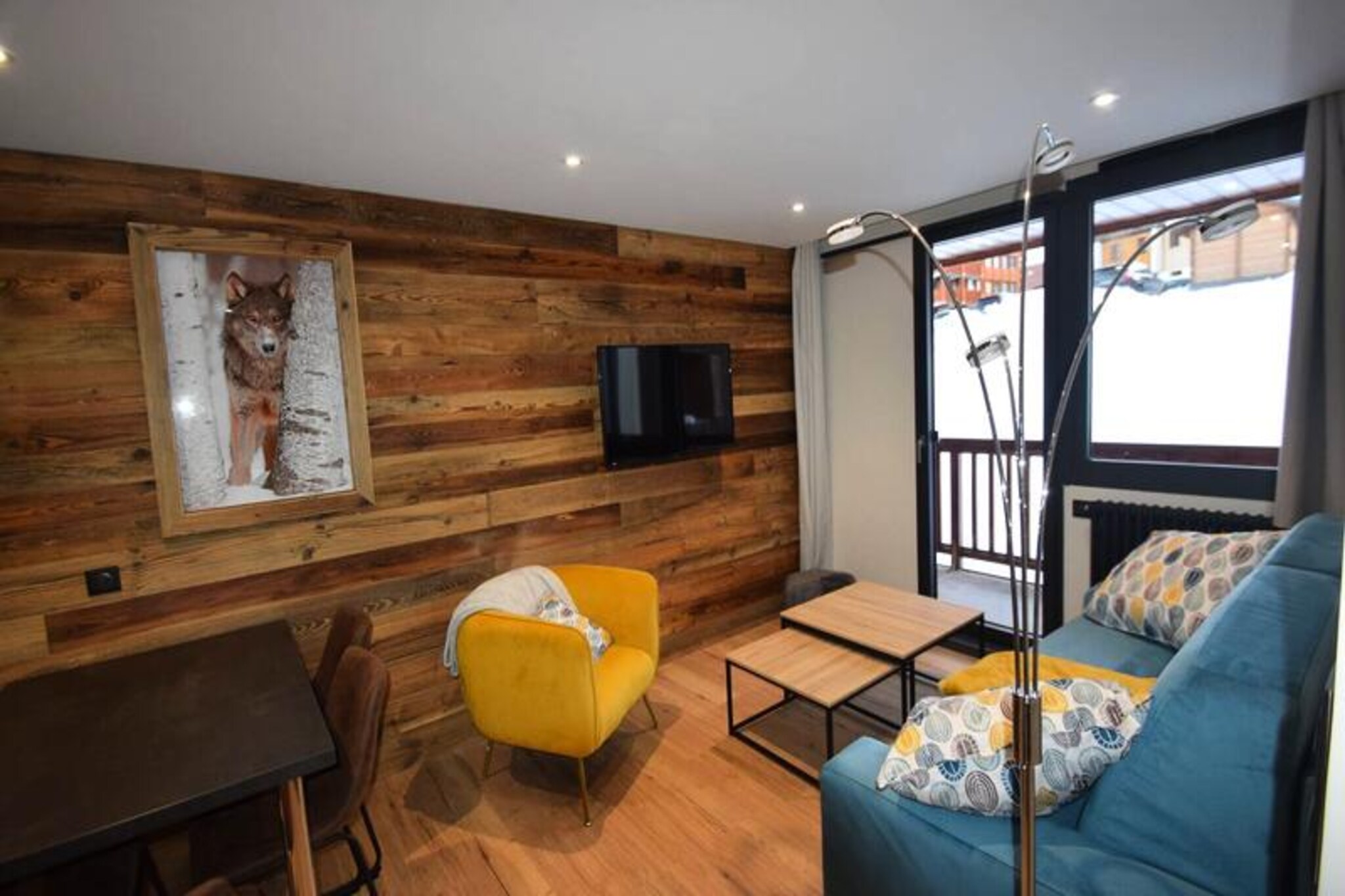 Awaken to the crisp alpine air and the serene charm of Plagne Centre in this beautifully renovated 2-room apartment. Perfectly situated for a mountain getaway, this south-facing retreat offers a cozy balcony on the 2nd floor, inviting you to soak in the panoramic views of the surrounding peaks. Whether you're here for the thrill of the slopes or the tranquility of the mountains, this apartment is your ideal base for an unforgettable escape. \n\nInside, the apartment is thoughtfully designed to accommodate up to four guests. The living room features a comfortable double sofa bed and a flat-screen TV, creating a warm space to unwind after a day of adventure. The fully equipped kitchen boasts modern amenities, including induction hobs, a conventional oven, a microwave, a refrigerator, a dishwasher, and a Nespresso machine, ensuring you have everything you need to prepare delicious meals. The separate bedroom offers a plush double bed, while the bathroom includes a sleek shower and a separate toilet for added convenience. With parquet-effect vinyl flooring and duvets for all bedding, every detail has been considered to enhance your comfort. \n\nLocated just 200 meters from the slopes, you’ll have easy access to the world-class skiing and snowboarding that La Plagne is renowned for. After a day on the mountain, explore the vibrant village of Plagne Centre, where you’ll find charming restaurants, shops, and après-ski options. For added convenience, the apartment includes Wi-Fi, two ski lockers, and a covered parking space. \n\nWhether you’re seeking adventure on the slopes or a peaceful retreat in the mountains, this apartment offers the perfect combination of comfort, convenience, and alpine charm. Make your next holiday truly special with a stay in this delightful residence.