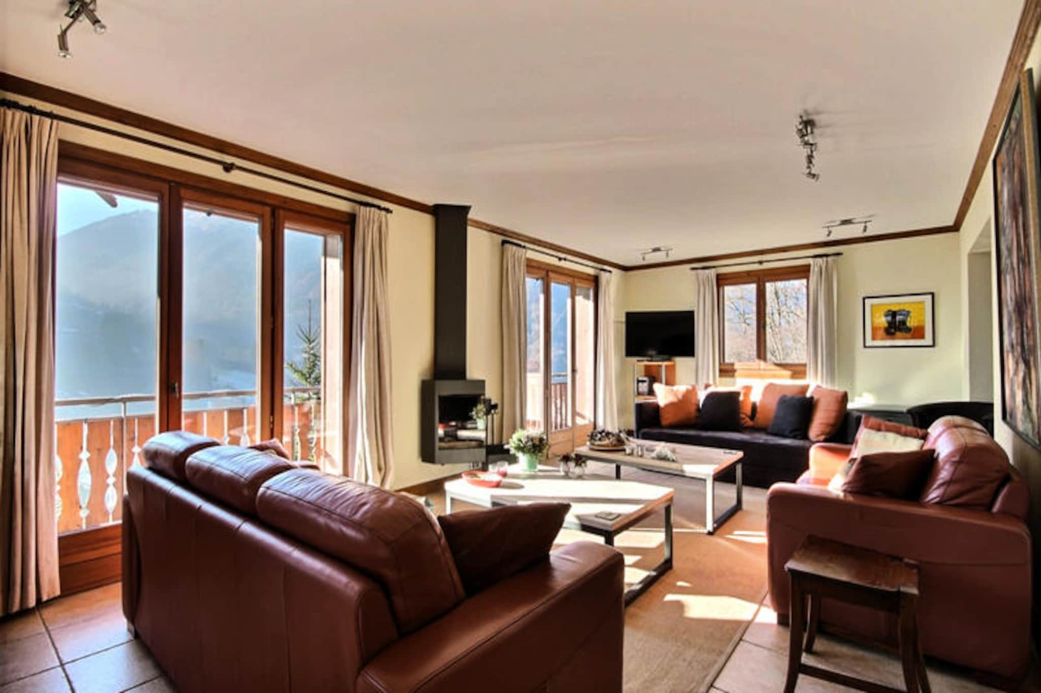 Perched on the sunlit southern slopes of Saint Jean d'Aulps, Chalet Taptop offers a serene retreat with breathtaking views of the Roc d’Enfer ski resort and the charming village below. This spacious 220 m² chalet is designed to accommodate up to 10 guests, making it perfect for families or groups seeking both comfort and adventure in the heart of the Haute-Savoie region. Whether you're planning a winter escape or a summer getaway, this property promises unforgettable moments surrounded by alpine beauty. \n\nThe chalet boasts five beautifully appointed bedrooms spread across three floors, ensuring privacy and relaxation for all. The ground floor features two bedrooms with en-suite bathrooms, a private garage, and a laundry room equipped with a washing machine and dryer. On the first floor, you’ll find a large, fully equipped kitchen with modern appliances, a cozy living room with a fireplace, satellite TV, and a stereo system, as well as a third bedroom and bathroom. The second floor offers two additional bedrooms, a bathroom with a bathtub and shower, and a spacious balcony overlooking the village. For families, baby equipment such as a crib and high chair is provided, along with thoughtful touches like raclette and fondue sets for sharing traditional alpine meals. \n\nStep outside to enjoy the large sheltered terrace and green space, complete with garden furniture and a barbecue for summer evenings. The chalet’s location is ideal for exploring the Portes du Soleil ski area, with the St Jean d'Aulps-Roc d'Enfer slopes just 2.5 km away and Morzine-Les Gets and Avoriaz within easy reach. Free shuttles to nearby resorts stop just 100 meters from the property, ensuring effortless access to world-class skiing. \n\nBeyond winter sports, the region offers a wealth of activities including hiking, mountain biking, horseback riding, and water sports on Lake Montriond. Discover local attractions such as the Pont du Diable Gorges, Aulps Abbey, and the picturesque towns of Annecy and Chamonix, all within an hour’s drive. With Geneva Airport just 1 hour 15 minutes away, Chalet Taptop is the perfect base for your alpine adventures. Book now to experience the charm and comfort of this exceptional property.