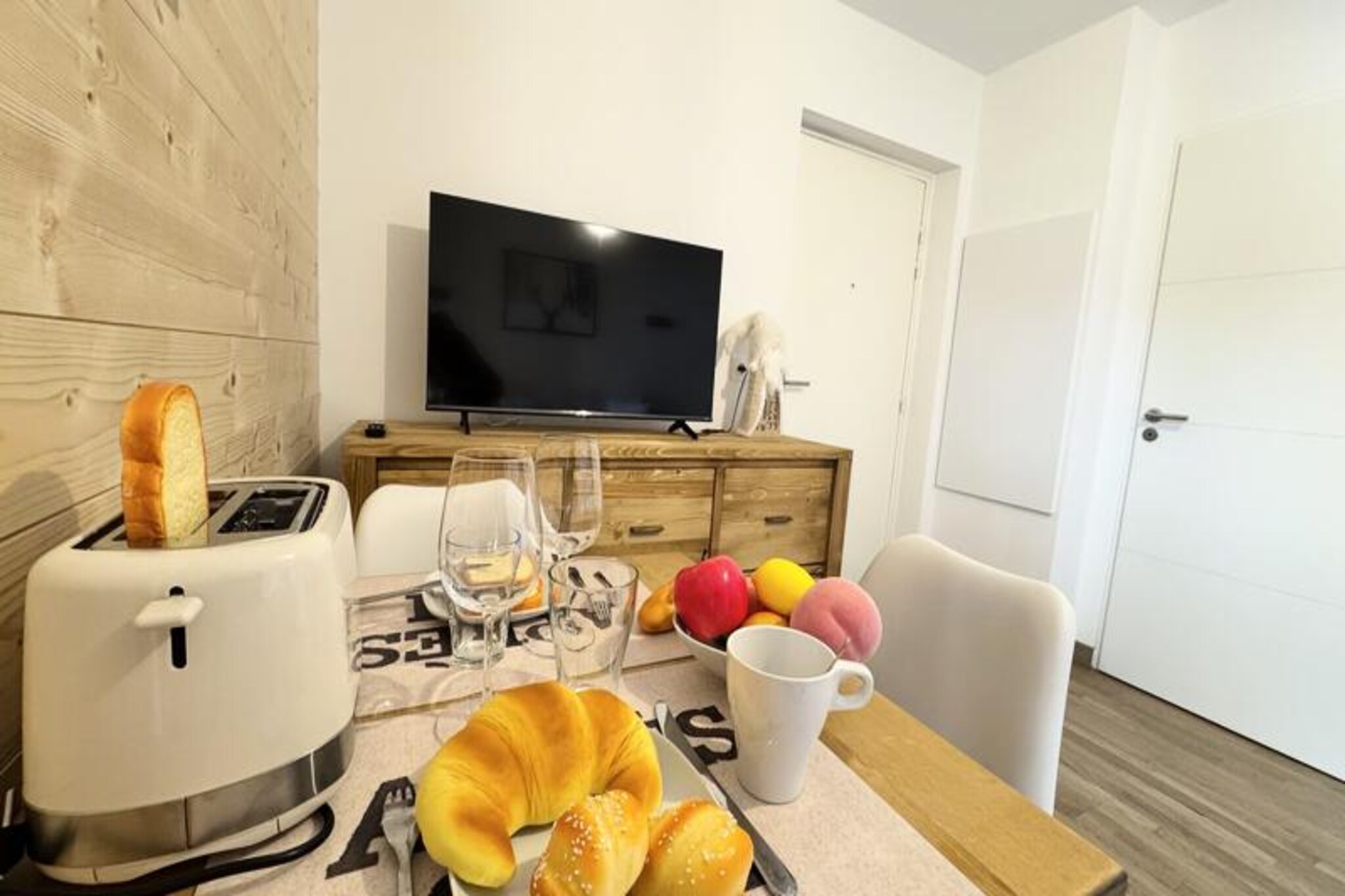 In the vibrant heart of Vars Les Claux resort, this cozy ground-floor studio apartment offers an inviting retreat just steps away from the slopes and local shops. Imagine waking up to the crisp mountain air, enjoying your morning coffee on the private terrace, and heading out for a day of alpine adventures with the snow front only 200 meters away. Whether you're here to ski, hike, or simply relax, this charming residence places you at the center of it all. \n\nDesigned for two guests, the apartment combines comfort and practicality with a bright living room that opens onto the terrace, creating a seamless indoor-outdoor experience. The 160x200 sofa bed ensures restful nights, while the fully equipped kitchen—complete with a microwave, dishwasher, Nespresso coffee machine, and refrigerator—makes meal preparation effortless. Additional amenities like a television and private covered parking add convenience to your stay, while linens and end-of-stay cleaning are included for a worry-free experience. \n\nVars Les Claux is renowned for its lively atmosphere and proximity to the slopes, making it a favorite destination for winter sports enthusiasts and summer adventurers alike. Explore the nearby trails, indulge in local cuisine, or simply soak in the breathtaking alpine views. While the residence is completed, please note that construction work is ongoing in the neighboring complex, which may affect the surroundings. \n\nPerfect for couples seeking a peaceful mountain escape, this smoke-free and pet-free apartment is your gateway to the beauty of the French Alps. Book your stay today and create unforgettable memories in this charming alpine haven.