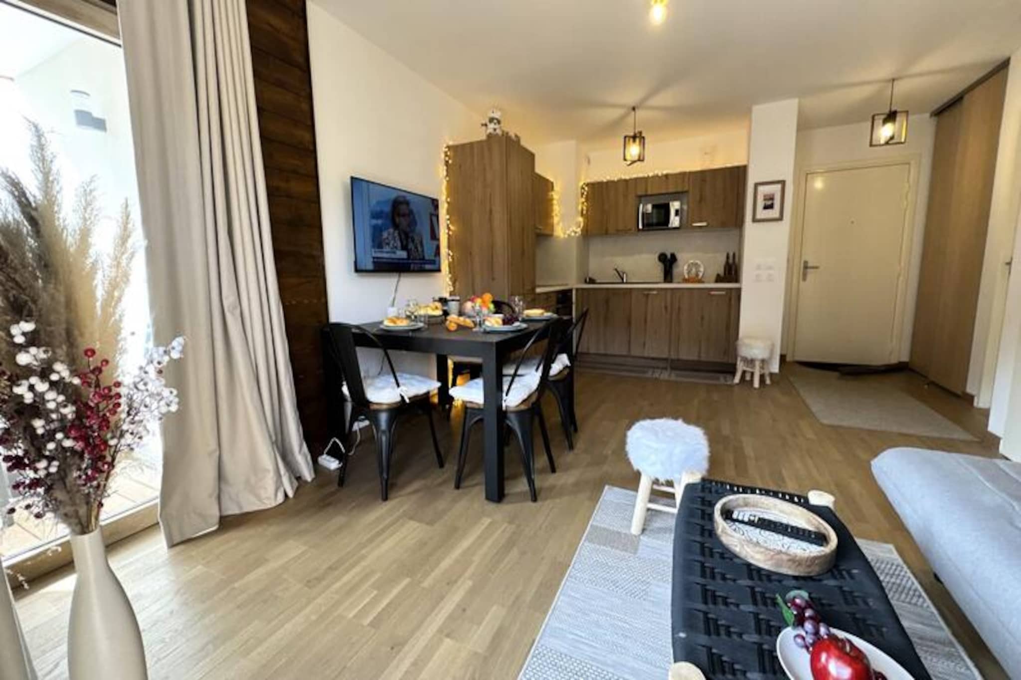 In the vibrant heart of Vars Les Claux resort, this delightful apartment offers a cozy retreat just 200 meters from the snow front, ensuring effortless access to the slopes. Wake up to the golden glow of the morning sun on your east-facing terrace, perfect for enjoying breakfast while soaking in the crisp mountain air. Whether you're here for thrilling winter sports or serene summer hikes, this residence places you at the center of alpine charm and adventure. The nearby shops and services make it easy to immerse yourself in the lively atmosphere of the resort, while the surrounding peaks promise breathtaking views and unforgettable moments. \n\nDesigned for up to six guests, the apartment boasts a thoughtful layout that combines comfort and practicality. The double bedroom is bathed in natural light, creating a peaceful haven for restful nights. Two single beds can be arranged to suit your needs, whether in the living room or bedroom, offering flexibility for families or friends. The spacious living area features a fully equipped kitchen with modern appliances, a dining table, a double sofa bed, and a television, ensuring a welcoming space to relax after a day of exploration. The bathroom is conveniently fitted with a toilet, and amenities like a dishwasher, washing machine, and induction hob make your stay seamless. \n\nWith private covered parking included, you can enjoy hassle-free access to your vehicle, while the Vars agency nearby offers ski passes and equipment rentals to enhance your holiday experience. Although construction work is ongoing in the neighboring complex, the completed residence guarantees a tranquil and comfortable stay. Pets are not allowed, and the apartment is strictly non-smoking, ensuring a clean and pleasant environment for all guests. \n\nWhether you're drawn to the slopes or the serene beauty of the mountains, this charming apartment in Vars Les Claux is your gateway to an unforgettable alpine escape.