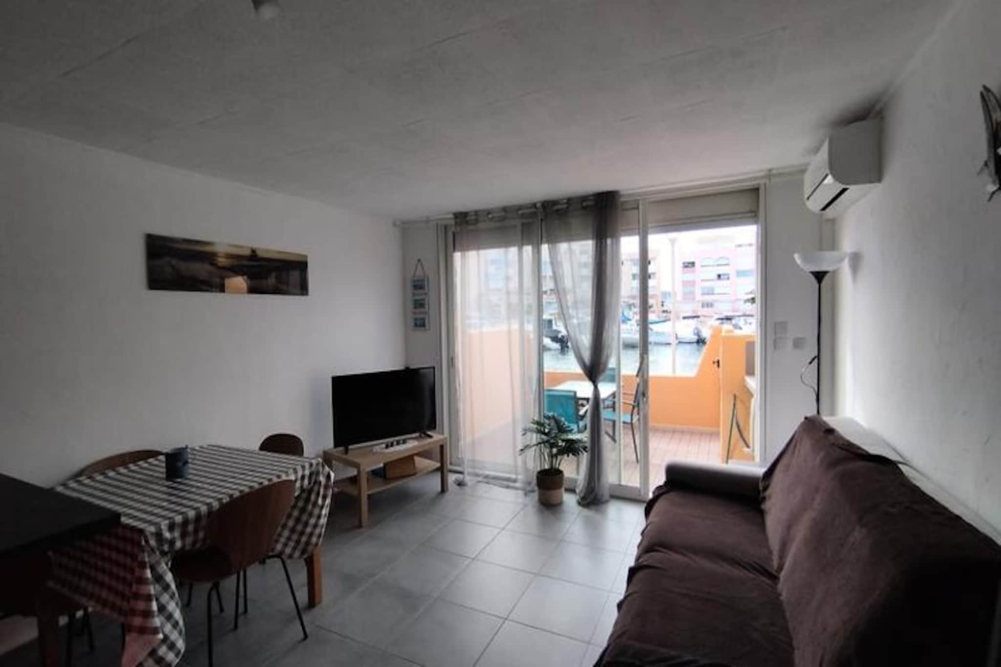 Imagine waking up to the gentle sound of waves and the sight of boats gliding across the marina — this charming one-bedroom apartment in Frontignan Plage offers the perfect coastal escape. With its prime location between the port and the beach, this air-conditioned retreat invites you to unwind and enjoy the Mediterranean lifestyle. Whether you're sipping your morning coffee on the terrace overlooking the marina or strolling along the sandy shores just moments away, every day here feels like a holiday. 
 
  Designed to comfortably accommodate up to four guests, the apartment features a cozy living room with air conditioning, a well-equipped kitchen for preparing fresh local delicacies, and a separate bedroom that opens onto a private balcony. The clever layout includes a sleeping area with bunk beds, making it ideal for families or small groups. A private parking space ensures convenience, so you can explore the region without worry. 
 
  Frontignan Plage is a haven for beach lovers and water enthusiasts. Spend your days basking in the sun, trying out water sports, or exploring the vibrant marina with its charming restaurants and shops. The nearby Étang de Thau offers opportunities for oyster tasting and birdwatching, while the historic town of Sète, known as the 'Venice of Languedoc,' is just a short drive away. 
 
  Whether you're seeking relaxation or adventure, this delightful apartment provides the perfect base for an unforgettable Mediterranean getaway.