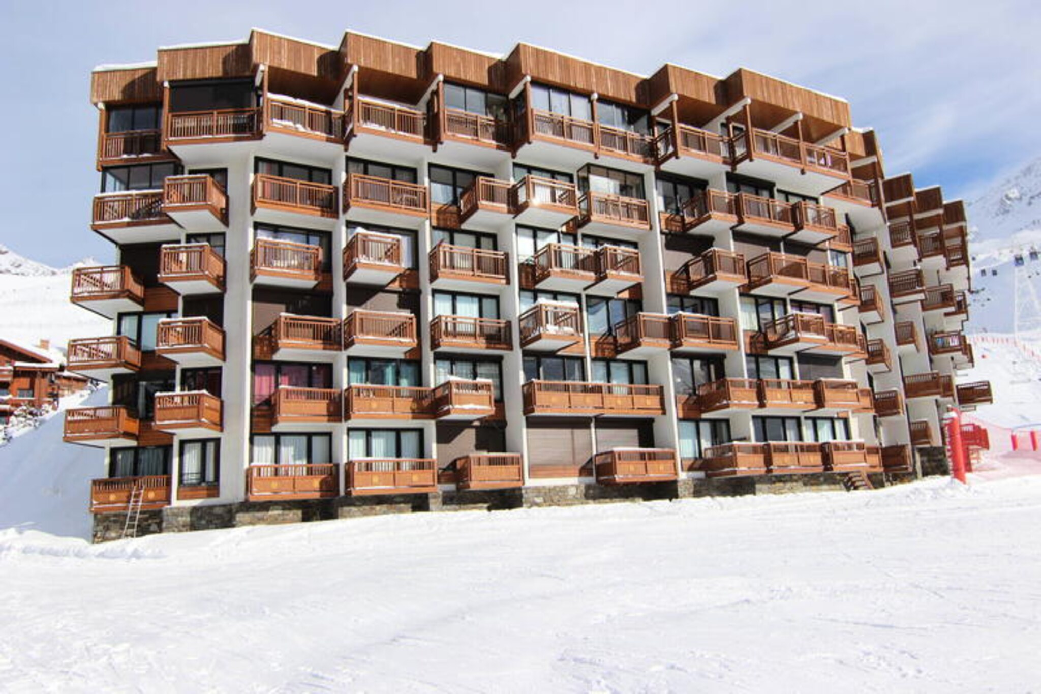 High above the bustling slopes of Val Thorens, this charming apartment in the Roc de Péclet residence offers a tranquil retreat in the serene Slalom district. Perfectly positioned for ski enthusiasts, it boasts direct access to the slopes, ensuring your alpine adventures begin the moment you step outside. With the ESF mini-club just next door, families with young children will find convenience and fun during school holidays, while the nearby Péclet shopping center, only 200 meters away, provides a variety of local shops and restaurants to explore after a day on the mountain. \n\nThis cozy 47m² ground-floor apartment is thoughtfully designed to accommodate up to six guests. The south-facing balcony invites you to soak in the sunshine and admire the stunning views of the surrounding peaks. Inside, the living room features a comfortable sofa bed and a sleeping area with bunk beds, while the separate bedroom offers a double bed for restful nights. The kitchenette is equipped with an oven, microwave, electric stovetop, refrigerator, and dishwasher, making it easy to prepare hearty meals after an exhilarating day on the slopes. A modern bathroom with a shower and sink, along with a separate toilet, ensures convenience and comfort for all guests. \n\nThe Roc de Péclet residence is ideally located for those seeking both adventure and relaxation. Ski rental shops such as SKISET and Goitschel Sport are just 200 meters away, making it effortless to gear up for your next descent. Beyond skiing, Val Thorens transforms in the summer months into a paradise for hikers and mountain bikers, with trails that wind through breathtaking alpine landscapes. Whether you’re here for the thrill of winter sports or the serenity of summer escapes, this property offers the perfect base for creating unforgettable memories in the French Alps.
