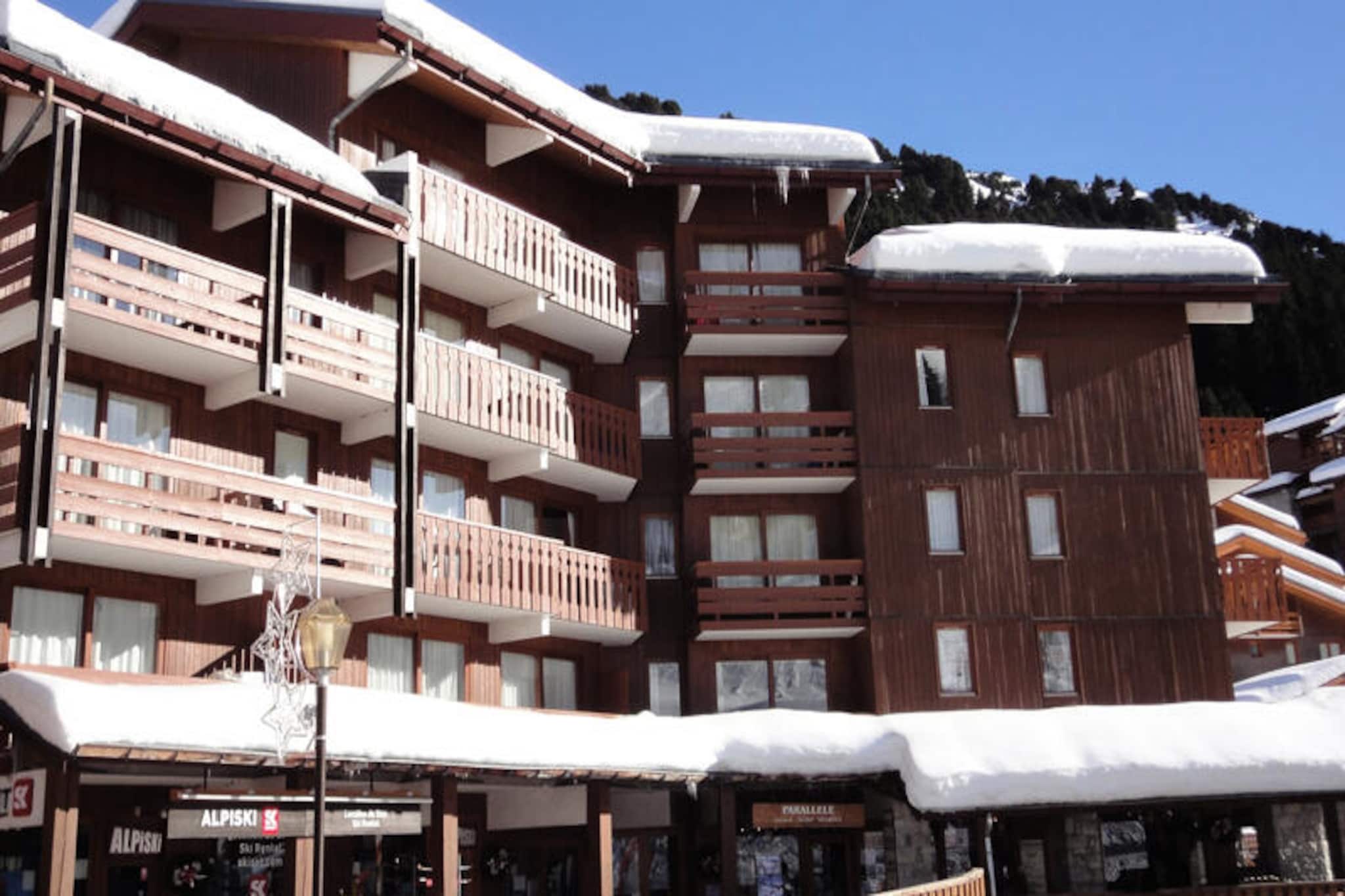 High above the shimmering slopes of Châtelet, this charming duplex apartment offers a cozy alpine retreat for up to six guests. With its south-facing balcony, you can soak in the breathtaking mountain views while sipping your morning coffee or unwinding after a day of adventure. Whether you're here for skiing, hiking, or simply relaxing, this residence places you at the heart of the action with the ski lifts just 100 meters away and the convenience of the Châtelet shopping center right at your doorstep. The ESF meeting point and Piou-Piou kindergarten are also nearby, making it an ideal choice for families with young children. \n\nThe apartment spans two levels, thoughtfully designed to maximize comfort and functionality. On the first level, you'll find a welcoming living room with a sofa bed and trundle bed, a cozy cabin with bunk beds, and a well-equipped kitchenette featuring modern appliances such as a dishwasher, microwave, and Nespresso coffee maker. A sleek shower room with a toilet completes this floor. Upstairs, accessible via steep stairs, you'll discover a small bedroom with a double bed, a single-bed cabin, and an additional bathroom. Flat-screen TV, heating, and thoughtful touches ensure a relaxing stay. \n\nStep outside, and you'll find everything you need within easy reach. The slopes are just a short walk away, allowing you to ski in and out with ease. The shuttle bus stop is conveniently located 50 meters from the supermarket, connecting you to nearby attractions and facilities. Whether you're exploring the pristine trails or indulging in local cuisine, this location offers the perfect blend of adventure and convenience. \n\nExperience the magic of the French Alps in this delightful home-away-from-home, where every moment is framed by the beauty of the mountains and the warmth of a welcoming space.