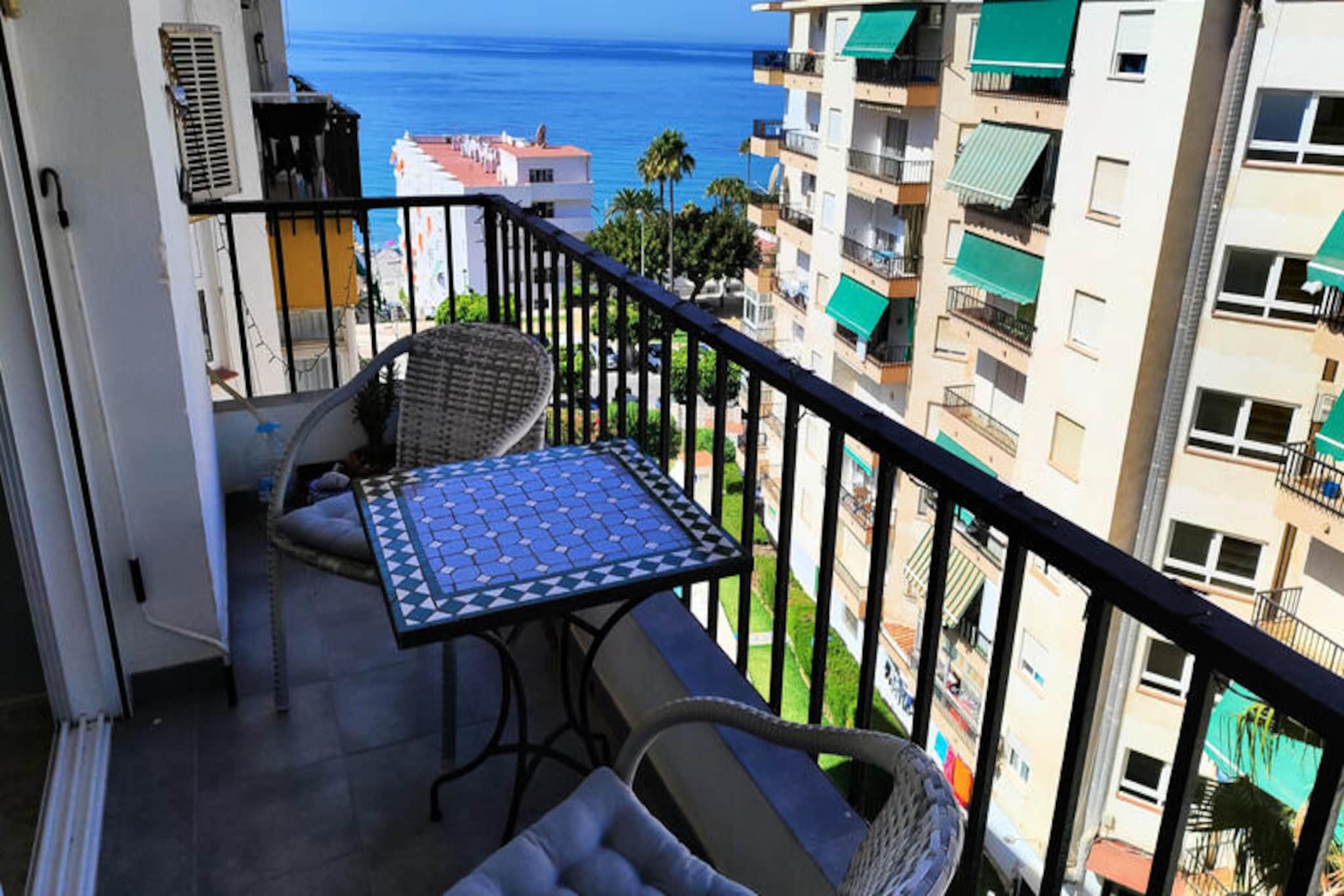 Imagine waking up to the gentle sound of waves and the golden light of the Spanish sun streaming through your window. This charming one-bedroom apartment, perched on the sixth floor, offers a serene escape just steps from Torrecilla Beach. From your private balcony, enjoy breathtaking views of the sea and the surrounding mountains, as well as the lush interior gardens below. Whether you're seeking a romantic getaway or a peaceful retreat, this centrally located gem blends coastal beauty with modern convenience. 
 
 Inside, the apartment is thoughtfully designed for comfort and relaxation. The living room features a cozy sofa bed and an open-plan kitchen equipped with everything you need, from a refrigerator and microwave to a coffee maker and juicer. The bedroom boasts a comfortable double bed, while the bathroom includes a sleek shower. Modern amenities such as air conditioning, heating, WiFi, satellite TV, and a washing machine ensure a hassle-free stay. The pool, open until August 2025, invites you to cool off during the warm afternoons, with convenient hours to suit your schedule.
 
 Step outside, and you'll find yourself surrounded by a vibrant array of shops, restaurants, and leisure activities. Explore the nearby Maro Cerro Gordo nature reserve, take a scenic hike along the Río Chillar, or enjoy a family day at Aqua Tropic water park. For golf enthusiasts, Baviera Golf is just a short drive away, while the Viñuela dam and Sierra Nevada ski resort offer year-round adventures. With Málaga Picasso Airport only 80 km away, this apartment is the perfect base for discovering the best of Andalusia.
 
 Whether you're here to soak up the sun, explore the rich culture of the region, or simply unwind by the sea, this apartment promises an unforgettable stay in the heart of Spain's Costa del Sol.