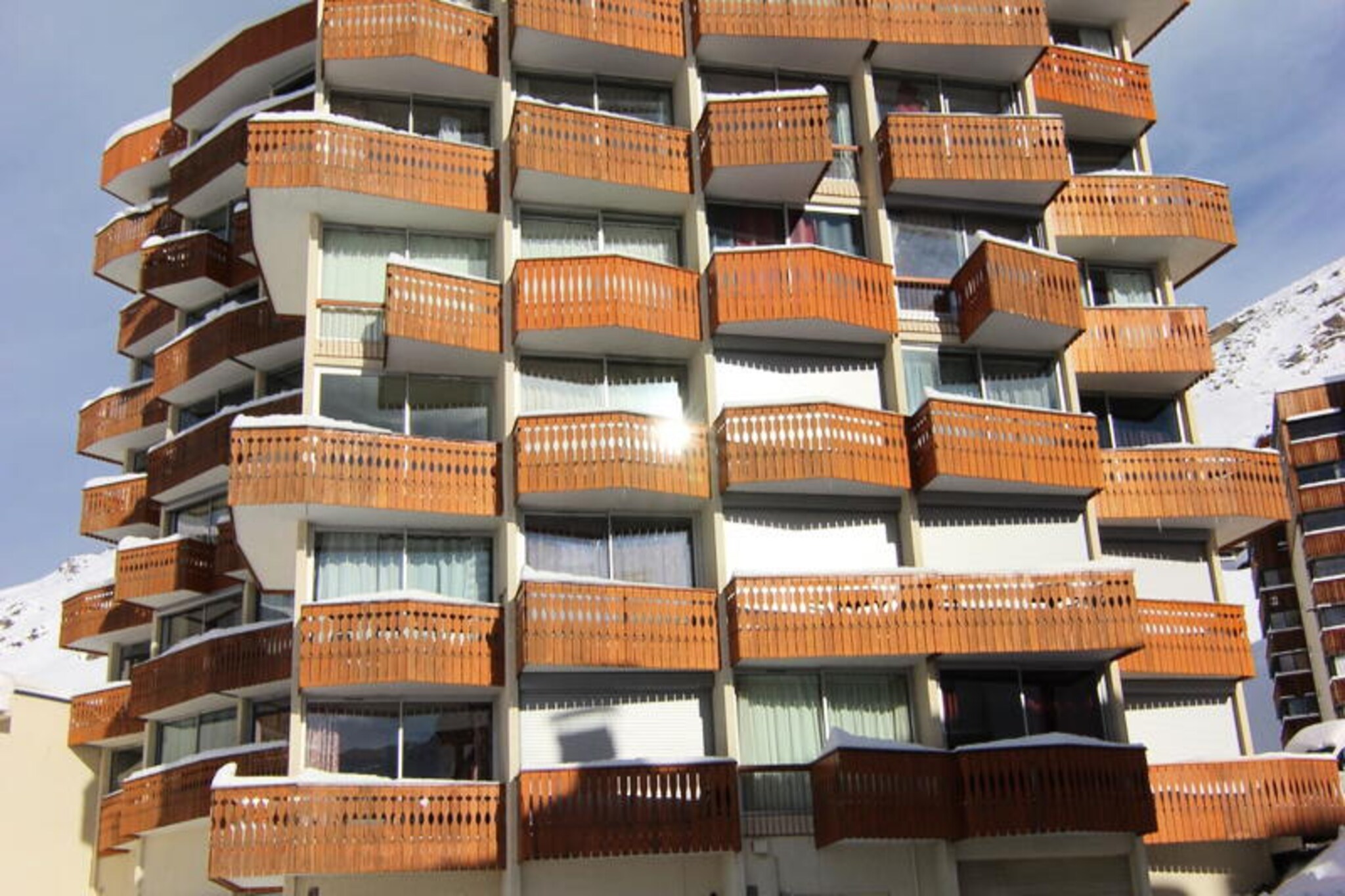 High above the vibrant Peclet district, this charming studio invites you to experience the magic of the French Alps. With its southeast-facing balcony, you can wake up to the crisp mountain air and breathtaking views while sipping your morning coffee. Just steps away, the Peclet shopping center offers a variety of restaurants and shops, ensuring convenience and entertainment right at your fingertips. Whether you're here for skiing or simply to relax, this cozy retreat is perfectly situated for an unforgettable alpine getaway. \n\nDesigned to accommodate up to three guests, the studio features a well-equipped kitchenette with a microwave/grill, refrigerator, and electric stovetop, making it easy to prepare meals after a day of adventure. The entrance includes bunk beds, while the living room boasts a comfortable sofa bed and a television for evening relaxation. The bathroom is fitted with a shower, sink, and toilet, ensuring all the essentials for a comfortable stay. \n\nFor ski enthusiasts, the location is unbeatable. The ski lift ticket office and direct access to the slopes are less than 50 meters away, allowing you to hit the pistes with ease. Families will appreciate the proximity to the ESF kindergarten, making it a great choice for those traveling with little ones. Nearby SKISET stores such as Snowberry and GS1 in the Peclet gallery provide all the equipment you need for your alpine adventures. \n\nWhether you're seeking thrilling days on the slopes or tranquil evenings soaking in the mountain views, this studio offers the perfect blend of comfort, convenience, and alpine charm. Make your next holiday one to remember in the heart of the French Alps.