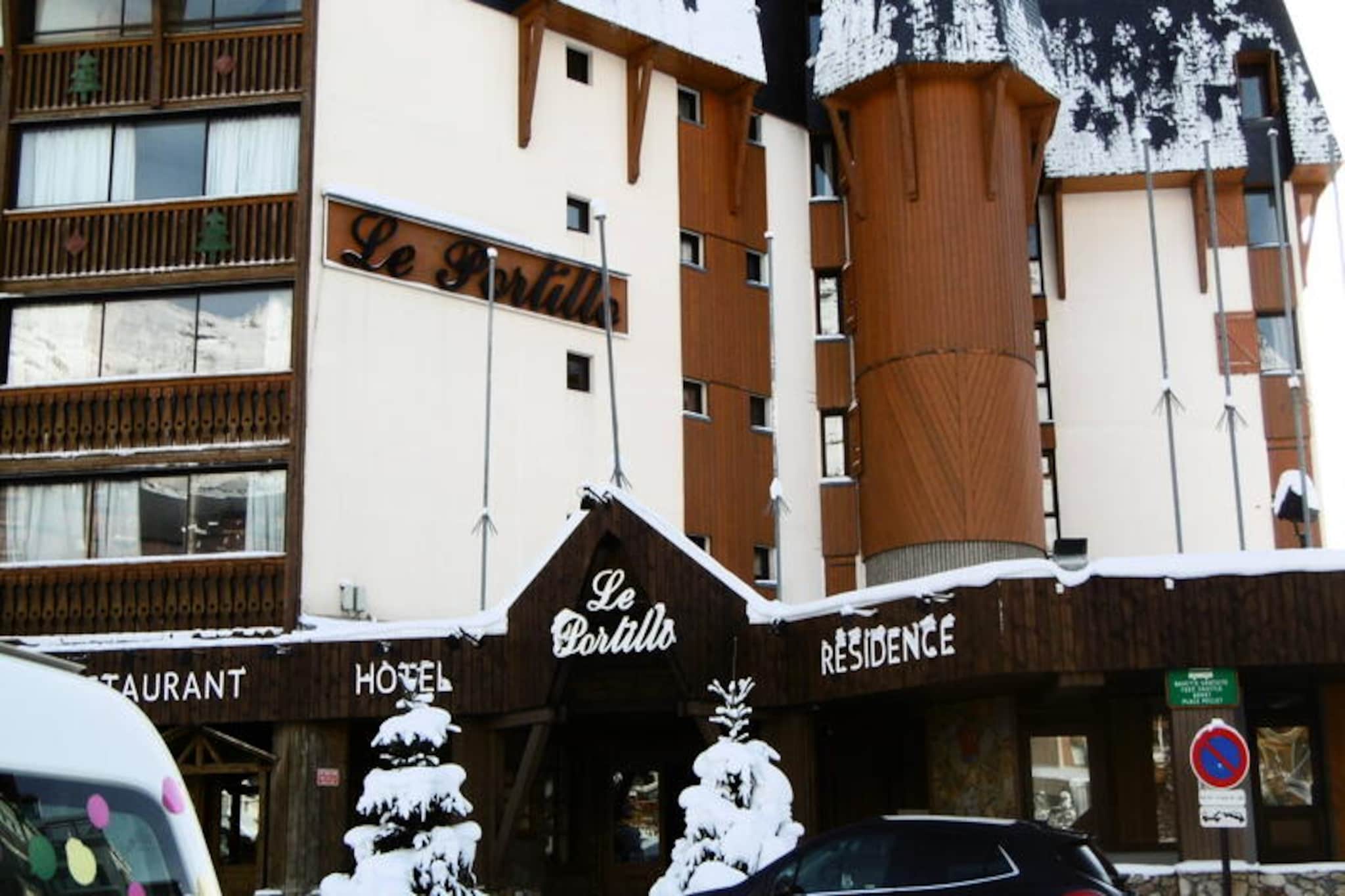 High above the vibrant resort of Val Thorens, the LE PORTILLO residence offers a serene retreat with breathtaking views of the surrounding peaks. Whether you're here for the thrill of the slopes or the tranquility of the alpine atmosphere, this charming apartment is perfectly positioned to make your stay unforgettable. Just 50 meters from the nearest ski access, you can step out and immerse yourself in the world-class skiing that has made Val Thorens a favorite destination for winter sports enthusiasts. The south/east-facing balcony invites you to soak in the morning sun while admiring the majestic mountain scenery. \n\nInside, the apartment is thoughtfully designed to accommodate up to four guests. The sleeping area features cozy bunk beds, while the living room includes a comfortable sofa bed for two. The spacious corner kitchen is fully equipped with modern amenities such as an oven, refrigerator, stovetop, and dishwasher, making it easy to prepare meals after a day of adventure. A separate toilet and bathroom ensure convenience and privacy during your stay. \n\nThe residence is ideally located near the Péclet shopping center, where you'll find a variety of shops, restaurants, and après-ski options to enhance your holiday experience. Whether you're exploring the slopes or enjoying the lively atmosphere of the resort, everything you need is just a short walk away. \n\nChoose the LE PORTILLO residence for a blend of comfort, convenience, and stunning alpine beauty. With its prime location and welcoming ambiance, this apartment is the perfect base for creating unforgettable memories in the heart of the French Alps.