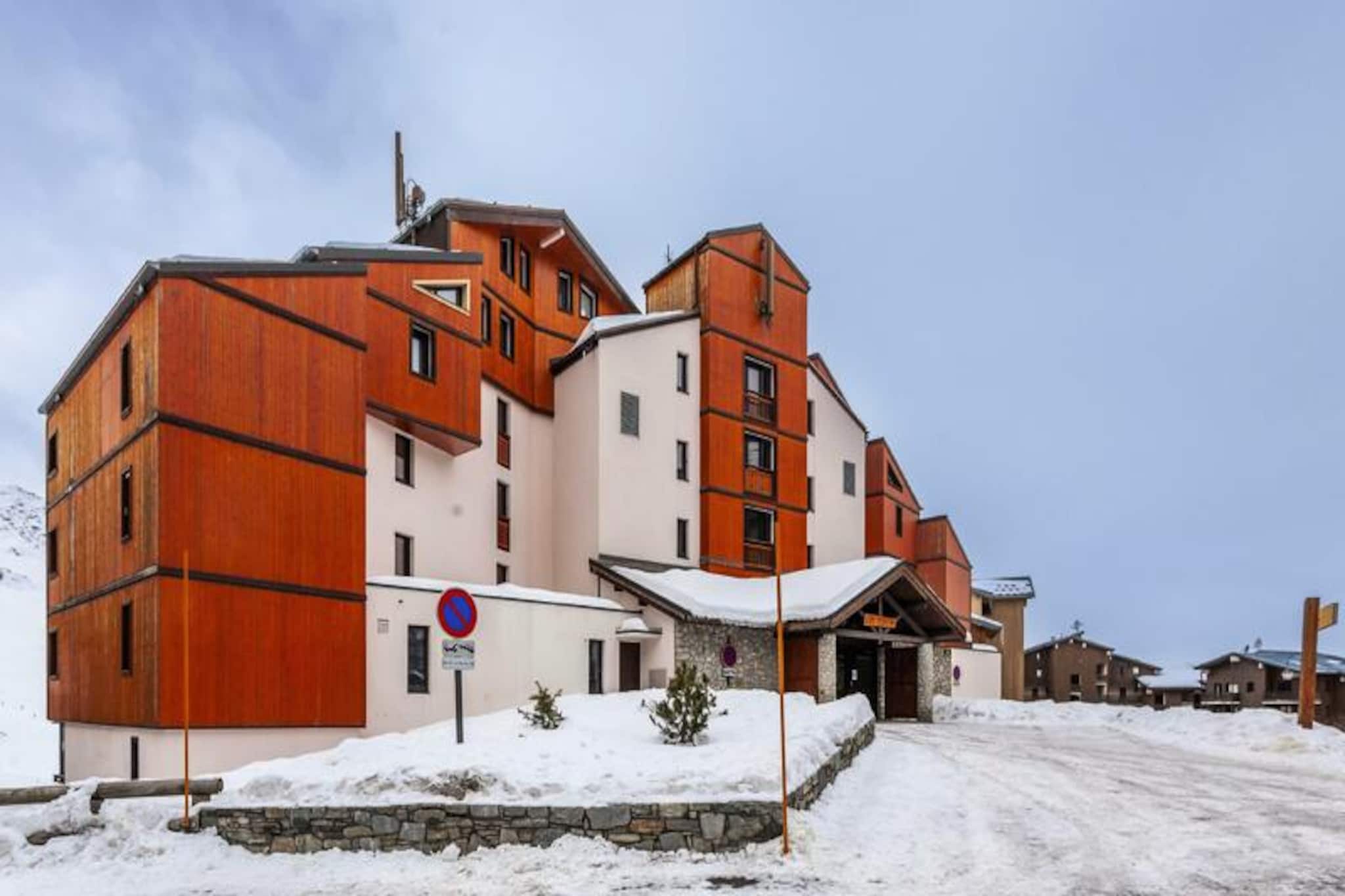 At the gateway to the vibrant resort of Val Thorens, this charming and fully renovated apartment offers a cozy retreat just 50 meters from the nearest ski slopes. Located in the LE JOKER residence, its proximity to the Caron shopping center and sports complex ensures that everything you need is within easy reach, whether you're seeking adventure on the slopes or a relaxing day exploring the village. The southwest-facing balcony invites you to soak in the alpine sun and take in the breathtaking mountain views after an exhilarating day outdoors. \n\nThis thoughtfully designed 35 m² apartment comfortably accommodates up to four guests. It features a double bedroom, a sleeping alcove with bunk beds, and a welcoming living, dining, and kitchen area. The kitchen is fully equipped with modern appliances, including a refrigerator, dishwasher, electric stovetop, and oven, making it easy to prepare hearty meals to enjoy with loved ones. The separate toilet and bathroom add convenience, ensuring a comfortable stay for all. Please note that pets are not allowed, and additional services such as linens, towels, and parking are available upon reservation. \n\nWith its unbeatable location, you'll find yourself steps away from the slopes and the lively atmosphere of Val Thorens. Whether you're skiing, snowboarding, or simply enjoying the après-ski scene, this apartment is the perfect base for your alpine getaway. In the summer, the area transforms into a haven for hikers and mountain bikers, offering endless trails and stunning vistas. Make unforgettable memories in the heart of the French Alps, where adventure and relaxation come together seamlessly.