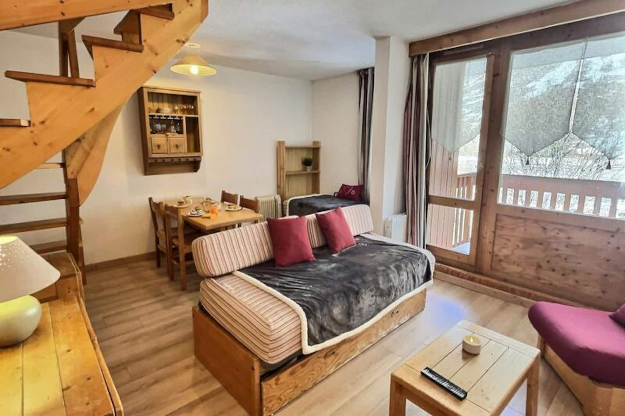 High above the picturesque valley of Val d’Isère, this charming mezzanine studio offers a serene retreat for your alpine adventures. Situated in the tranquil Hameaux de Val neighborhood, this residence combines convenience with peace, making it an ideal choice for both winter sports enthusiasts and summer nature lovers. From your north-facing balcony, take in the sweeping views of the valley as you sip your morning coffee or unwind after a day of exploration. The residence itself features an elevator, a caretaker, and even a daycare center, ensuring a stress-free stay for families and groups alike.
Inside, the 42 m² studio is thoughtfully designed to accommodate up to six guests. The living room boasts two sets of trundle beds, while the mezzanine offers a cozy double bed for restful nights. The fully equipped kitchen, complete with an induction hob, microwave, dishwasher, and refrigerator, invites you to prepare hearty meals to fuel your adventures. A modern bathroom with a spacious shower and a separate toilet add to the comfort, while amenities like a television, ski locker, and covered parking space ensure convenience throughout your stay.
The location is unbeatable: just 500 meters from the Laisinant Express chairlift and the village center, with skiing possible within 100 meters of the residence depending on snow conditions. A cross-country ski trail is also just steps away. The shuttle bus stop, only 30 meters from the residence, provides easy access to the entire area, running frequently from early morning until late at night. At the foot of the residence, you’ll find a SPAR supermarket, a sports store, and a pizzeria, adding to the convenience.
Whether you’re here to carve through fresh powder, hike the stunning mountain trails, or simply soak in the alpine charm, this studio in Val d’Isère promises an unforgettable escape. Book your stay today and experience the magic of the French Alps.