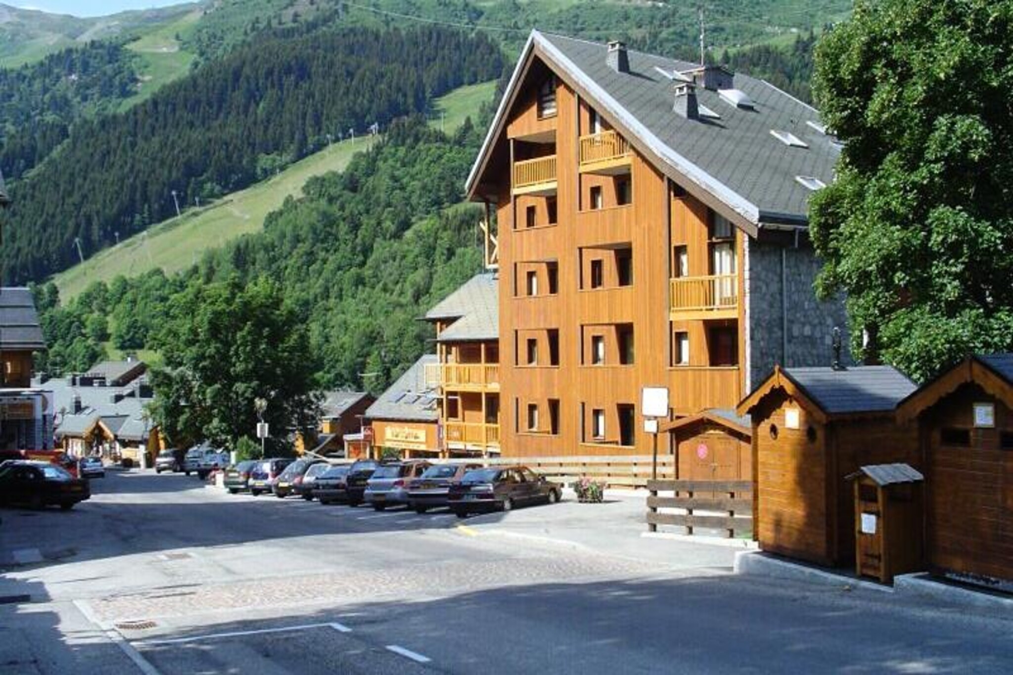 In the heart of Méribel’s vibrant village, this charming duplex studio offers an inviting retreat for mountain lovers seeking a blend of adventure and relaxation. Set on a lively street lined with shops and restaurants, the property places you just moments away from the renowned slopes of the Three Valleys, promising unforgettable days of skiing or hiking amidst breathtaking alpine scenery. From its west-facing terrace, soak in the tranquil views of the surrounding mountains and residences, a perfect spot to unwind after an active day outdoors. \n\nDesigned for up to four guests, this 40m² studio combines comfort and practicality. The living room features a cozy double sofa bed, while the mezzanine opens onto the living area with a spacious double bed. The well-equipped kitchen includes a ceramic hob, microwave, dishwasher, and refrigerator, making it easy to prepare meals and snacks. A bathroom with a bathtub and separate toilet ensures convenience, while additional amenities such as Wi-Fi, television, and a ski locker enhance your stay. \n\nMéribel’s central location within the Three Valleys means you’re perfectly positioned to explore one of the world’s largest ski domains. Beyond winter sports, the area transforms into a summer paradise with hiking trails, mountain biking routes, and picturesque picnic spots. The village itself offers a warm and welcoming atmosphere, with après-ski activities, local delicacies, and cultural events adding to its charm. \n\nWhether you’re seeking thrilling alpine adventures or serene mountain escapes, this studio provides the ideal base for creating lasting memories in the French Alps.