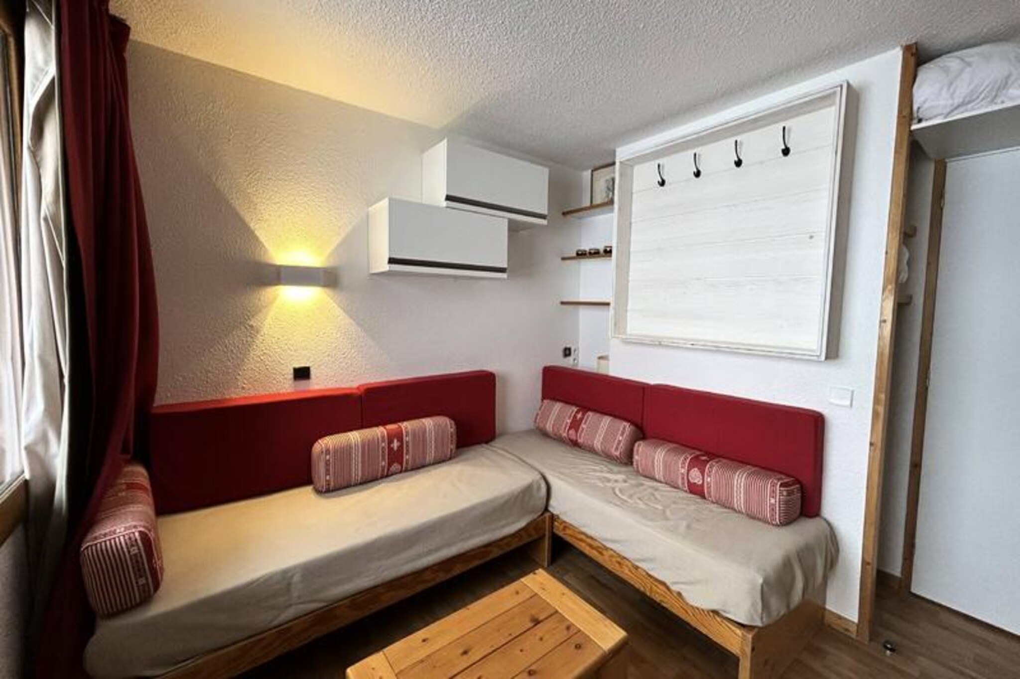 Perched on the serene heights of Méribel Mottaret, this charming apartment in the Le Candide residence offers a perfect blend of comfort and convenience for your alpine escape. Imagine waking up to the crisp mountain air, with the slopes just outside your door, ready to whisk you away into the heart of the Three Valleys ski area. Whether you're here for winter sports or summer adventures, this location promises unforgettable moments amidst breathtaking scenery.
The apartment is thoughtfully designed to cater to your every need. The living room features a movable partition, allowing you to create two private spaces for added flexibility. The renovated bathroom boasts modern amenities, including a heated towel rail for extra comfort after a day on the slopes. The separate kitchen is fully equipped with a dishwasher, electric stovetop, refrigerator, microwave, toaster, and coffee maker, making it easy to prepare meals. Additional conveniences such as an elevator in the building ensure a hassle-free stay. Please note that this is a non-smoking property, and pets are not allowed.
Le Candide is ideally situated in the Laitelet district, a peaceful enclave with direct access to the slopes and close proximity to shops, restaurants, and bars. The free Chalets cable car provides easy access to the center of Méribel Mottaret, where you can explore more of the resort's vibrant offerings. Paid covered parking is available nearby, adding to the convenience.
Whether you're seeking thrilling ski runs, scenic hiking trails, or simply a tranquil retreat in the mountains, this apartment offers the perfect base to create lasting memories in the French Alps.