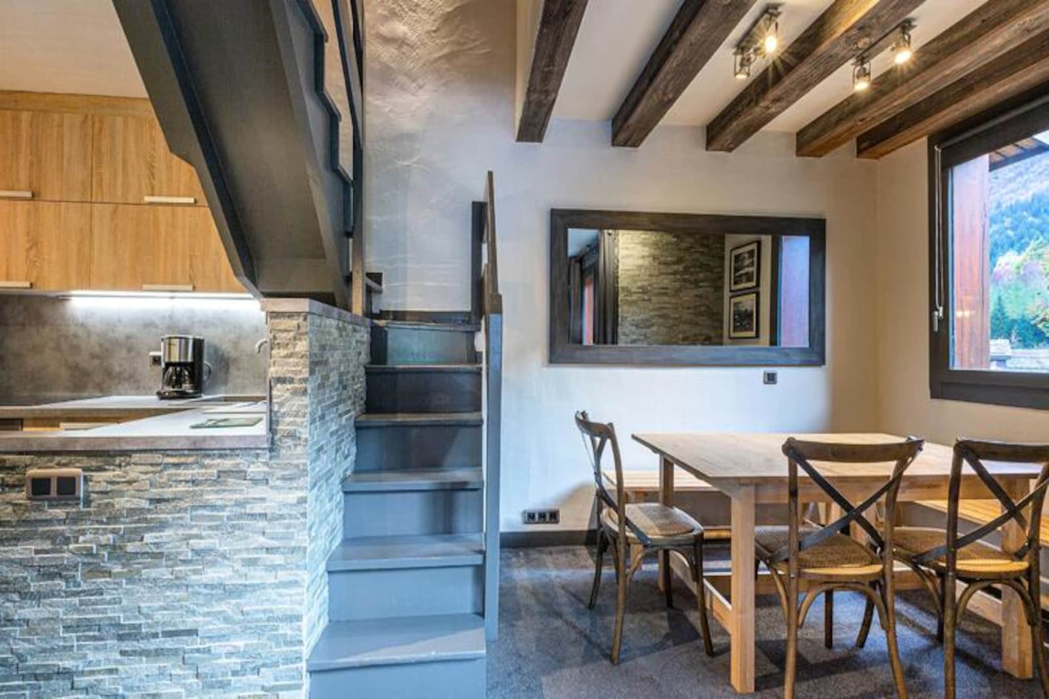 Perched in the picturesque Crève Coeur hamlet of Valmorel, this charming 4-room apartment offers an unbeatable location for ski enthusiasts and nature lovers alike. With the slopes just outside your door and the Télèbourg ski lift a mere 80 meters away, your alpine adventures begin the moment you step outside. Imagine sipping your morning coffee on the southeast-facing balcony, soaking in the breathtaking views of the snowy pistes and surrounding mountain peaks. This cozy retreat is perfect for families or groups seeking a comfortable and convenient base in the heart of the French Alps. \n\nInside, the apartment is thoughtfully designed to accommodate up to eight guests. The open-plan kitchen is fully equipped with a dishwasher, electric hob, microwave, oven, and refrigerator, making it easy to prepare hearty meals after a day on the slopes. The living room, complete with a dining area and television, provides a welcoming space to unwind. Upstairs, you'll find a bunk bed and two single beds in one room, a double bed in the attic bedroom, and a single bed with a trundle in another. The apartment also features a bathroom, a separate toilet, and a shower room with an additional toilet, ensuring ample facilities for all guests. \n\nThe Crève Coeur hamlet is ideally situated, offering easy access to essential shops such as a bakery, sports store, and convenience store. The ESF ski school is just 350 meters away, accessible via the Télèbourg ski lift, making it a great choice for families with children or beginners looking to refine their skills. In addition, paid parking is conveniently located in front of the residence, and the nearby La Lauzière Dessous residence provides ski lockers for added convenience. \n\nWhether you’re here for the thrill of skiing, the charm of Valmorel’s alpine village, or simply to relax and take in the stunning scenery, this apartment is your gateway to unforgettable memories in the French Alps. Book your stay and experience the magic of Crève Coeur for yourself.