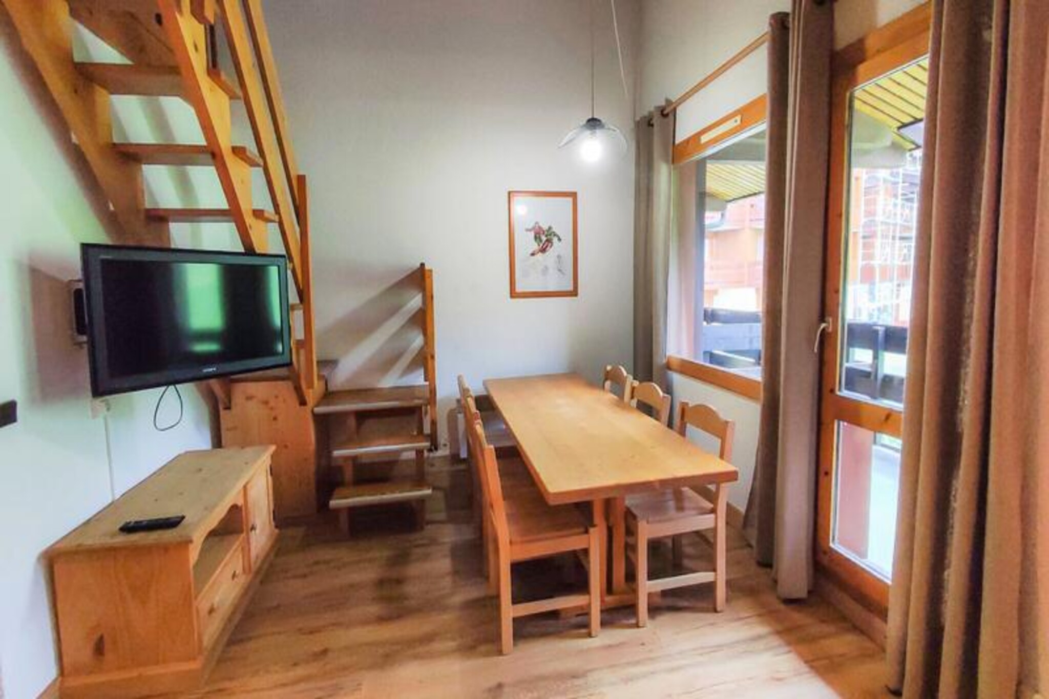 In the charming hamlet of Le Mottet, this delightful 3-room duplex offers a quintessential alpine retreat, perfect for ski enthusiasts and families alike. With the slopes just 20 meters away and the ski school a mere 50 meters from your doorstep, the convenience of ski-in/ski-out access ensures every moment of your holiday is spent enjoying the pristine snow of the Valmorel ski area. The pedestrianized setting adds to the serene atmosphere, making it a safe and peaceful haven for families with children. From the west-facing balcony, soak in the breathtaking views of the surrounding slopes and the enchanting alpine landscape. \n\nThe apartment spans 50m² and is thoughtfully designed to accommodate up to eight guests. The divisible living room features two single sofa beds, offering flexibility and comfort. Upstairs, the mezzanine boasts two single beds, while the separate bedroom includes two sets of bunk beds, making it ideal for families or groups of friends. The property includes a bathroom with a separate toilet and an additional shower room upstairs for added convenience. While Wi-Fi is not included, the cozy interiors and well-equipped spaces ensure a comfortable stay. Please note that the apartment is non-smoking, does not allow pets, and is not accessible for guests with reduced mobility.\n\nLe Mottet’s location is unparalleled, with the Altispace slope right at your doorstep and the convenience of the Télèbourg cable car connecting you to the heart of Valmorel resort. Shops, restaurants, and après-ski options are just 300 meters away, ensuring everything you need is within easy reach. In winter, enjoy the thrill of skiing, while summer opens up a world of hiking trails and mountain adventures. For added ease, underground parking is available for a fee, ensuring a stress-free arrival and departure.\n\nWhether you’re here to carve through the snow, explore the scenic beauty of the French Alps, or simply relax in the tranquil surroundings, this duplex in Le Mottet promises an unforgettable alpine escape. With its prime location, comfortable amenities, and stunning views, it’s the perfect choice for your next mountain getaway.