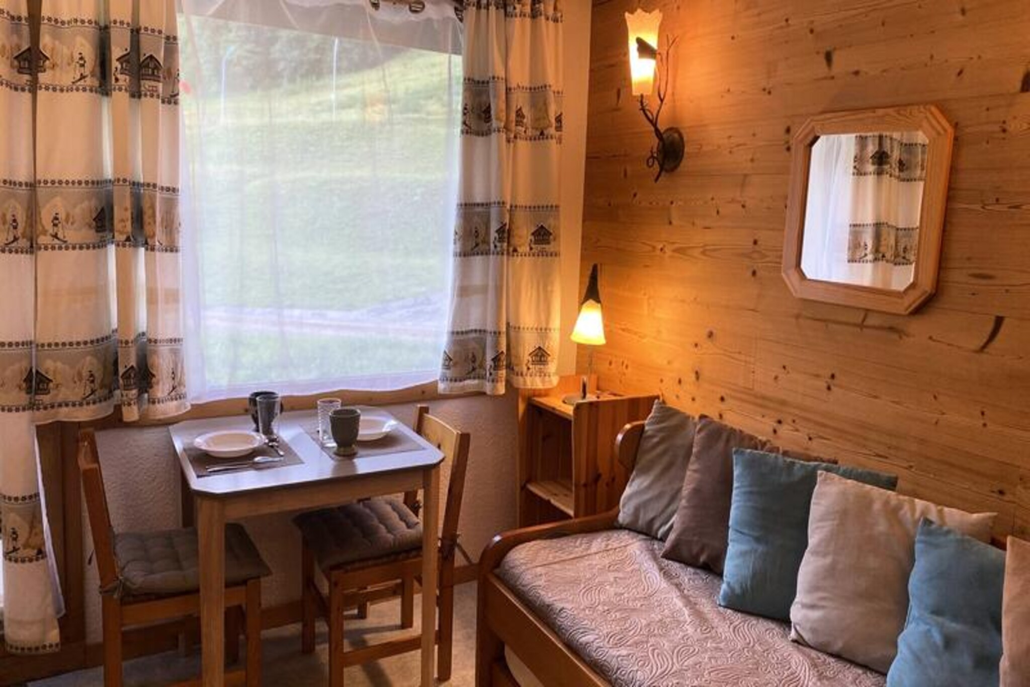 Imagine waking up to the crisp mountain air and stepping out onto your private terrace to take in the serene, unobstructed views of the French Alps. This cozy 13m² studio apartment, located in the heart of the Mottet area in Valmorel, is the perfect retreat for two skiers seeking a convenient and comfortable alpine escape. With the ski slopes and ESF ski school just steps away, your day of adventure begins the moment you leave the front door. The pedestrian-friendly neighborhood ensures a peaceful and safe environment, ideal for families and couples alike. \n\nInside, the apartment is thoughtfully designed to maximize space and comfort. The living area features a single bed and a trundle bed, providing flexible sleeping arrangements. The kitchenette is equipped with a ceramic hob and microwave, perfect for preparing quick meals after a day on the slopes. The shower room with WC is compact yet functional, and the east-facing terrace offers a tranquil spot to unwind with a warm drink as you watch the sunrise over the mountains. Additional amenities include a ski locker for your equipment and the option to bring your furry companion for a small supplement. \n\nBeyond the apartment, the Mottet area offers unparalleled access to the slopes and ski school, making it a favorite among avid skiers and families with children. The Télèbourg cable car connects you effortlessly to the shops and lively center of Valmorel, where you can explore charming boutiques, cozy restaurants, and après-ski activities. For those arriving by car, underground parking is available with advance reservation. \n\nWhether you're here to carve through fresh powder, enjoy scenic alpine walks, or simply relax in the breathtaking surroundings, this studio apartment offers everything you need for an unforgettable mountain getaway.