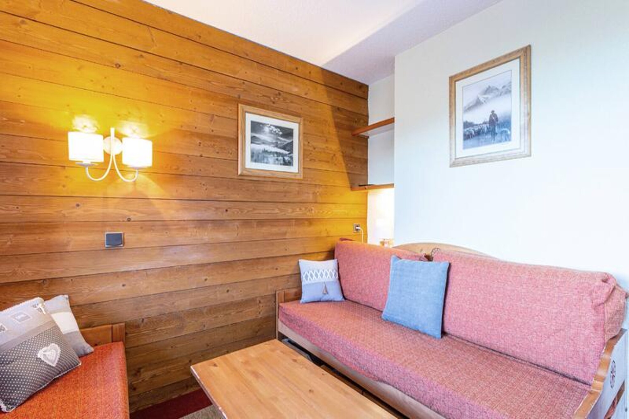 Perched in the scenic hamlet of Crève Coeur in Valmorel, this charming studio apartment offers a cozy retreat for up to four guests. With ski slopes just steps away and the nearest ski lift and shops only 100 meters from your door, this location is a dream for winter sports enthusiasts. The apartment's north-facing terrace provides stunning views of the valley, inviting you to savor the tranquil alpine atmosphere after a day of adventure. Whether you're here to ski, hike, or simply unwind, this residence combines convenience with authentic Savoyard charm. \n\nInside, the 27m² studio is thoughtfully designed with a movable partition that divides the living room into two sleeping areas, each featuring comfortable single beds. The kitchenette is equipped with modern amenities, including a dishwasher, electric stovetop, and microwave, ensuring you have everything needed to prepare meals during your stay. A separate bathroom and toilet add to the practicality, while the apartment's warm, well-maintained interiors make it a welcoming space to relax. Please note that Wi-Fi is not included, and the apartment is non-smoking and not accessible for guests with reduced mobility. \n\nThe surrounding area is rich with conveniences, including a bakery, mini-market, and sports store within walking distance. The Crève Coeur sector is well-connected to the resort center and the Mottet hamlet via the Télébourg cable car, making it easy to explore the wider Valmorel region. For those arriving by car, paid parking is available in front of the residence. \n\nWhether you're seeking thrilling days on the slopes or peaceful evenings soaking in the alpine views, this studio apartment in the Le Pierrer residence offers the perfect balance of comfort, charm, and proximity to all the essentials for an unforgettable mountain getaway.