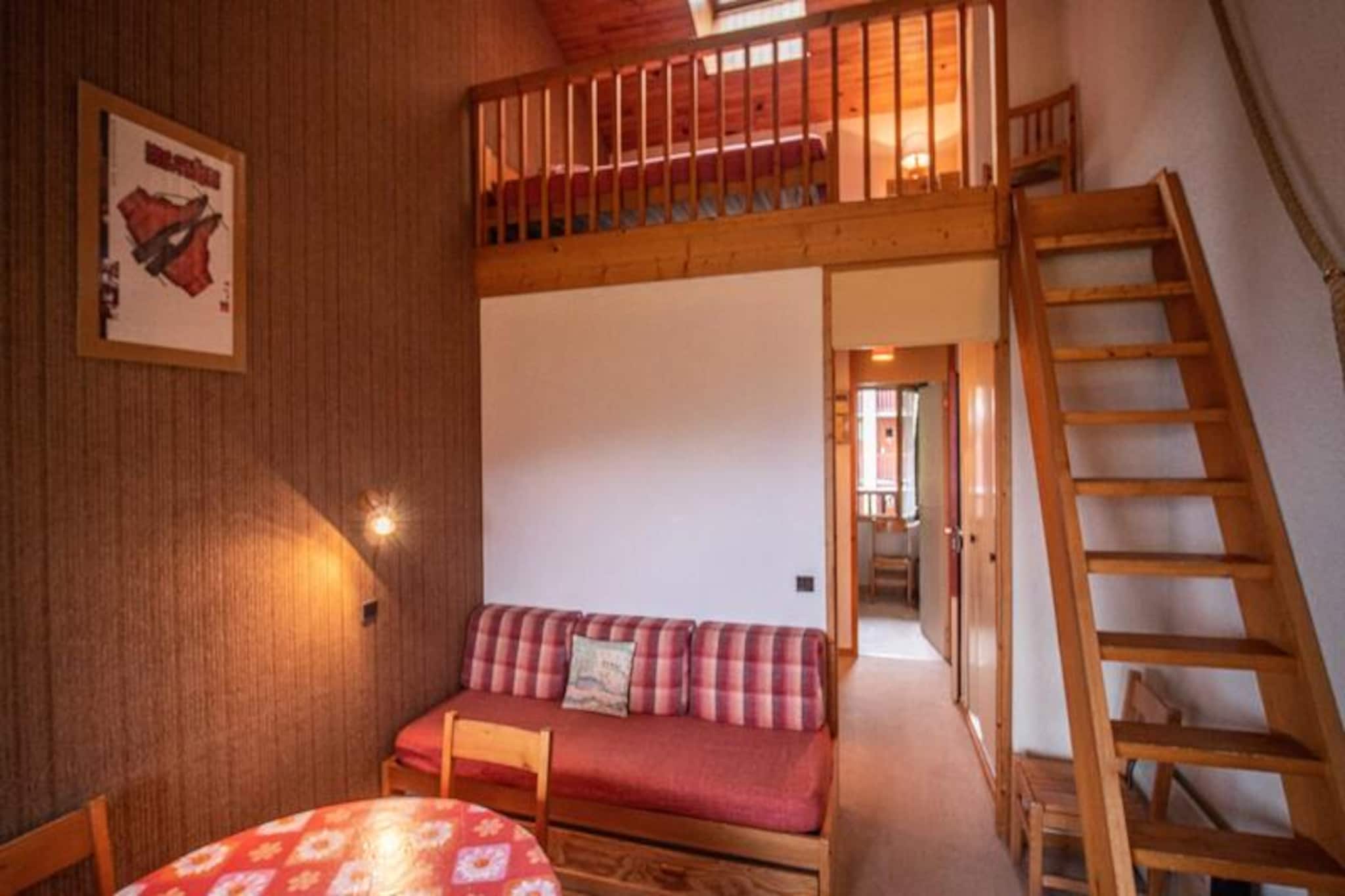 Perched in the serene hamlet of Le Mottet, this charming two-room mezzanine apartment offers a cozy alpine retreat with direct access to the slopes. Imagine stepping out onto your west-facing balcony, overlooking the pristine snow-covered trails, and breathing in the crisp mountain air as the sun sets over the peaks. This peaceful location is perfect for families and ski enthusiasts alike, blending tranquility with unparalleled convenience. The apartment is just 20 meters from the ski school and a short 300-meter stroll to shops, ensuring everything you need is within easy reach. \n\nInside, the 31m² space is thoughtfully designed to accommodate up to six guests. The living room features a comfortable sofa bed and trundle bed, while the bedroom and mezzanine each offer two single beds, providing flexible sleeping arrangements for families or groups. The separate kitchen is fully equipped with a dishwasher, electric hob, and oven, making it easy to prepare hearty meals after a day on the slopes. A bright and airy atmosphere fills the space, complemented by a modern bathroom and separate toilet for added convenience. The apartment also includes a ski locker and welcomes pets, making it a versatile choice for all travelers. \n\nLe Mottet is a haven for skiers, with its pedestrian-friendly area and direct connection to Valmorel's vibrant center via the Télébourg railway. Families with young children will appreciate the proximity to the kindergarten, accessible by lift, while older kids can join the ski school just steps away. During the day, explore the expansive slopes or enjoy the charming village atmosphere, and in the evening, unwind in the comfort of your mountain retreat. \n\nWhether you're seeking thrilling alpine adventures or a peaceful getaway surrounded by breathtaking scenery, this apartment in Le Mottet promises an unforgettable stay in the heart of the French Alps.