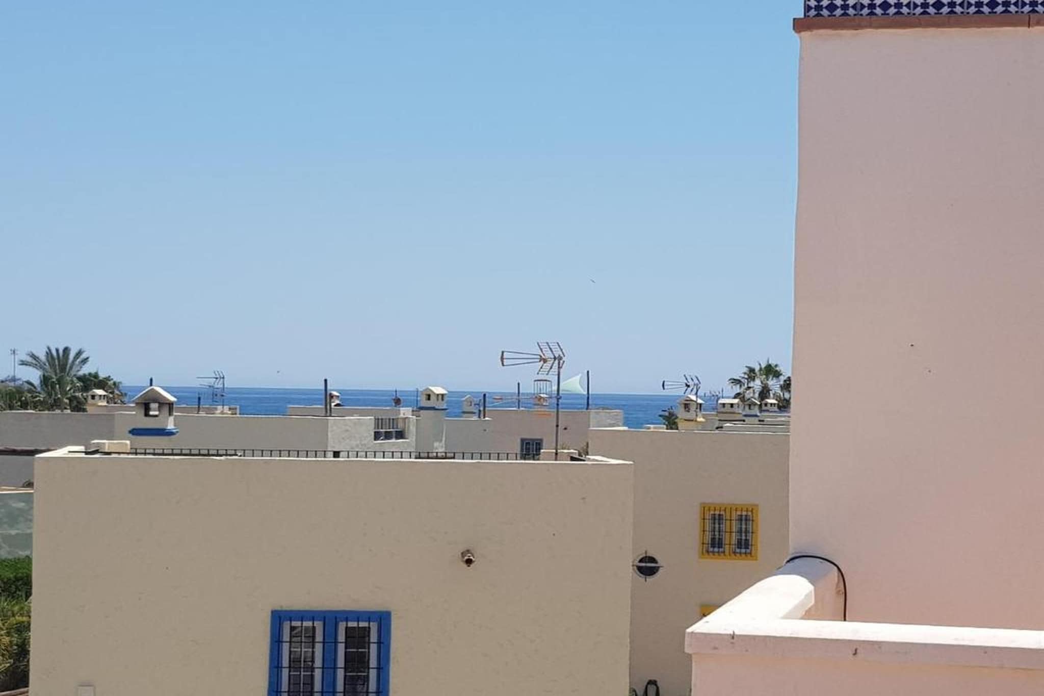 CT 341 AL - Faro's Casa Adosada-Uitzicht zomer