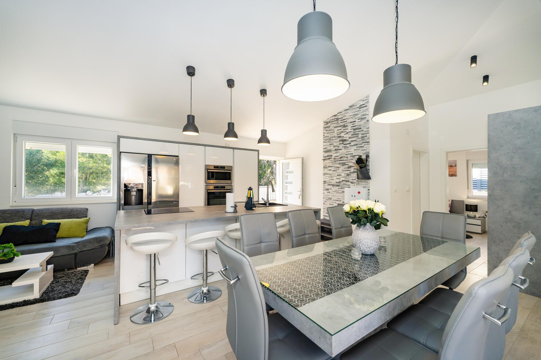 open kitchen(hob(induction), toaster, oven, microwave, dishwasher, fridge-freezer, dishes and cutlery(Bowls, chopsticks, plates, cups, etc.), Cooking basics(Pots and pans, oil, salt and pepper)), Living/diningroom(double sofa bed, TV(flatscreen, satellite, smart TV), dining table, seating area), bedroom(double king size bed, air conditioning), bedroom(double king size bed, air conditioning), bedroom(double king size bed, air conditioning), bathroom(shower, washbasin, toilet), bathroom(shower, washbasin, toilet), outdoor kitchen, Internet access, Parking, First Aid, Dining room, Garden, Garden Furniture , fireplace, sun shower, washing machine, patio, air conditioning, terrace(10 m2), garden, garden furniture, sun loungers, BBQ, parking, deckchairs, swimming pool(private, outside), ironing board, hairdryer, lounge set, outdoor fireplace, hot water