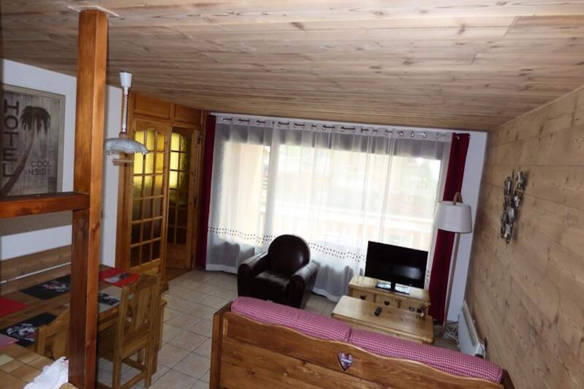 In the heart of the vibrant La Meije residence, this charming alpine retreat offers the perfect blend of comfort and convenience for your next mountain getaway. With its prime location in the center of the resort, everything you need is just steps away, from shops and restaurants to ski lifts and trails. Whether you're seeking thrilling slopes or serene alpine views, this property places you at the center of it all. \n\nThe apartment spans 47m² and is thoughtfully designed to accommodate up to six guests. The cozy bedroom features a double bed and its own TV, while the living room offers two bunk beds and a sofa bed, making it ideal for families or groups of friends. The fully equipped kitchen includes a microwave, dishwasher, electric hotplates, mini oven, and refrigerator, ensuring you have everything you need to prepare hearty meals after a day of adventure. The modern bathroom boasts a walk-in shower, and the south-facing balcony invites you to relax and soak in the sunshine with a cup of coffee or a glass of wine. \n\nFor ski enthusiasts, the property includes a dedicated ski locker, making it easy to store your gear after a day on the slopes. Outdoor parking is also available for added convenience. Beyond the apartment, you'll find yourself immersed in the lively atmosphere of the resort, with easy access to ski schools, après-ski spots, and breathtaking mountain trails. \n\nWhether you're visiting in winter for world-class skiing or in summer to explore the lush alpine landscapes, this cozy retreat in La Meije is the perfect base for unforgettable memories in the French Alps.