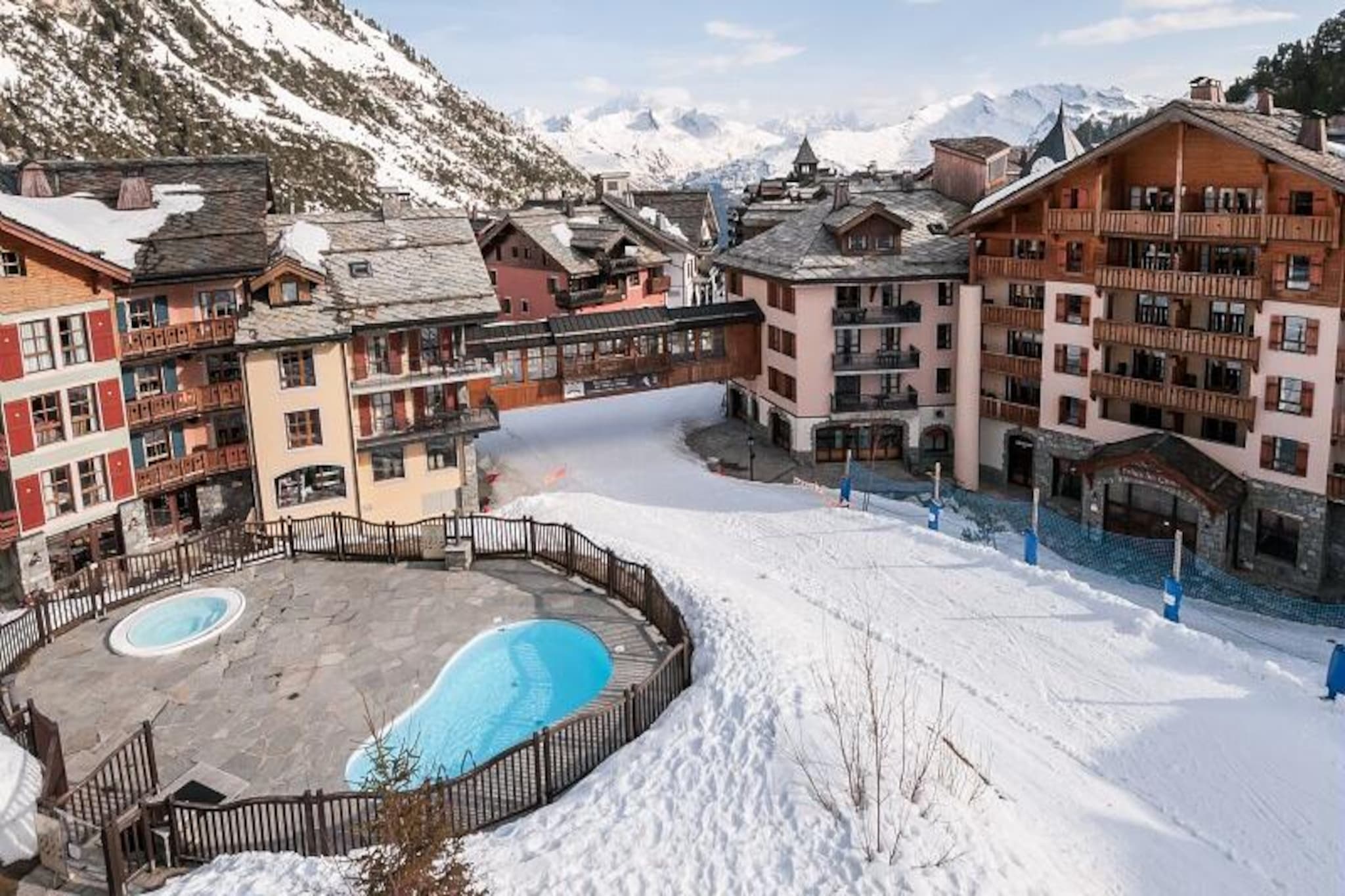 High in the heart of the French Alps, where snow-dusted peaks meet luxury and charm, lies the enchanting Arc 1950 village. This unique, fully pedestrianized resort offers an unparalleled ski-in/ski-out experience, making it a haven for winter sports enthusiasts and summer adventurers alike. Imagine waking up to breathtaking views of Mont Blanc, stepping onto pristine slopes, or exploring lush hiking trails that stretch over 700 kilometers in the warmer months. Arc 1950 is more than a destination; it’s an alpine dream brought to life.
Your spacious 61 m² apartment, located in the Les Sources de Marie building, is designed for comfort and style. With two cozy bedrooms, a fully equipped kitchen, and a bright living area featuring a sofa bed, it comfortably accommodates up to six guests. Modern amenities include two bathrooms, one en-suite with a bathtub-shower, and a separate toilet for added convenience. While balconies are temporarily closed, the interior offers a warm and inviting retreat after a day of adventure.
The village boasts a wealth of amenities to enhance your stay. Relax in the Deep Nature Spa, indulge in heated pools, saunas, and jacuzzis, or explore the 40 shops, bars, and restaurants just steps from your door. In the summer, the 180 km bike park and proximity to the Vanoise National Park make it a paradise for outdoor enthusiasts.
Whether you’re seeking thrilling ski runs, tranquil spa days, or unforgettable alpine vistas, this property at Arc 1950 promises a holiday filled with luxury, adventure, and cherished memories.