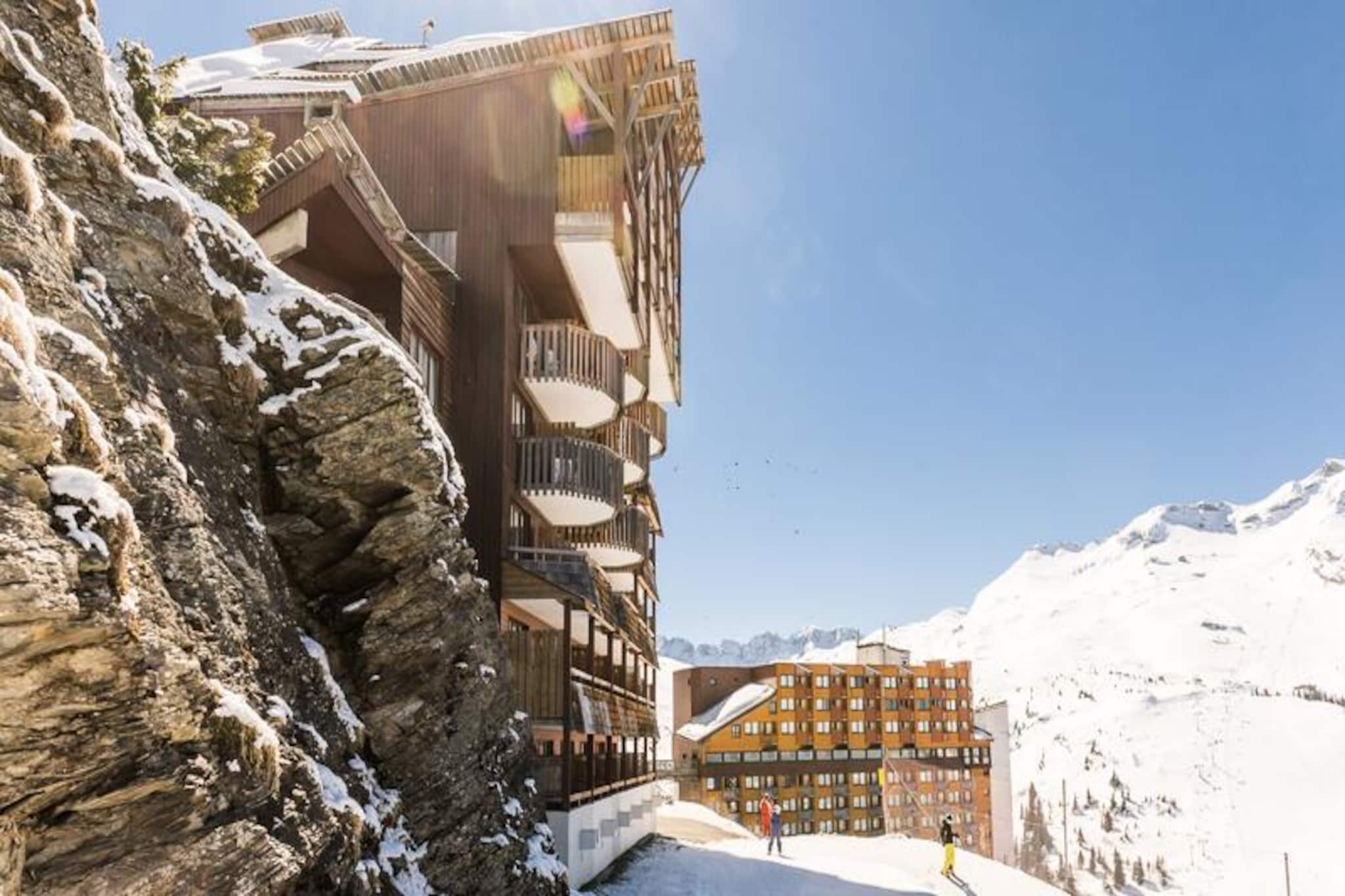 High above the valley at 1,800 meters, the Antarès Residence offers a unique alpine escape in the heart of Avoriaz, a pedestrian-friendly resort perfect for families and winter sports enthusiasts. Imagine waking up to breathtaking views of snow-covered peaks, stepping out onto your balcony to breathe in crisp mountain air, and heading straight onto the slopes with ski-in/ski-out access right from your doorstep. This is where adventure meets tranquility, surrounded by the beauty of the Portes du Soleil ski area, one of the largest and most diverse in the world, spanning both France and Switzerland. \n\nThe apartments are thoughtfully designed to provide comfort and convenience for up to four guests. Each unit features a cozy living room with sofa beds, a fully equipped kitchen opening onto the living space, a separate bedroom with a double bed, and a modern bathroom. The balcony offers stunning mountain views, creating the perfect spot to unwind after a day of skiing or exploring. Essential amenities such as Wi-Fi, bed linen, towels, and end-of-stay cleaning are included, ensuring a hassle-free stay. Families will appreciate the optional baby kit and pet-friendly accommodations, making it easy to bring everyone along for the adventure. \n\nAvoriaz is more than just a ski destination. Its pedestrianized streets create a safe and welcoming environment for families, while nearby attractions like the Aquariaz water park add variety to your holiday. Whether you’re gliding through fresh powder, exploring snow parks, or enjoying après-ski activities, the resort offers something for everyone. In summer, the landscape transforms into a haven for hikers and mountain bikers, with trails that showcase the region’s natural beauty. \n\nChoose Antarès Residence for a memorable alpine getaway where every detail is designed to enhance your experience. From the convenience of ski-in/ski-out access to the charm of a car-free resort, this is a place where unforgettable memories are made year-round.