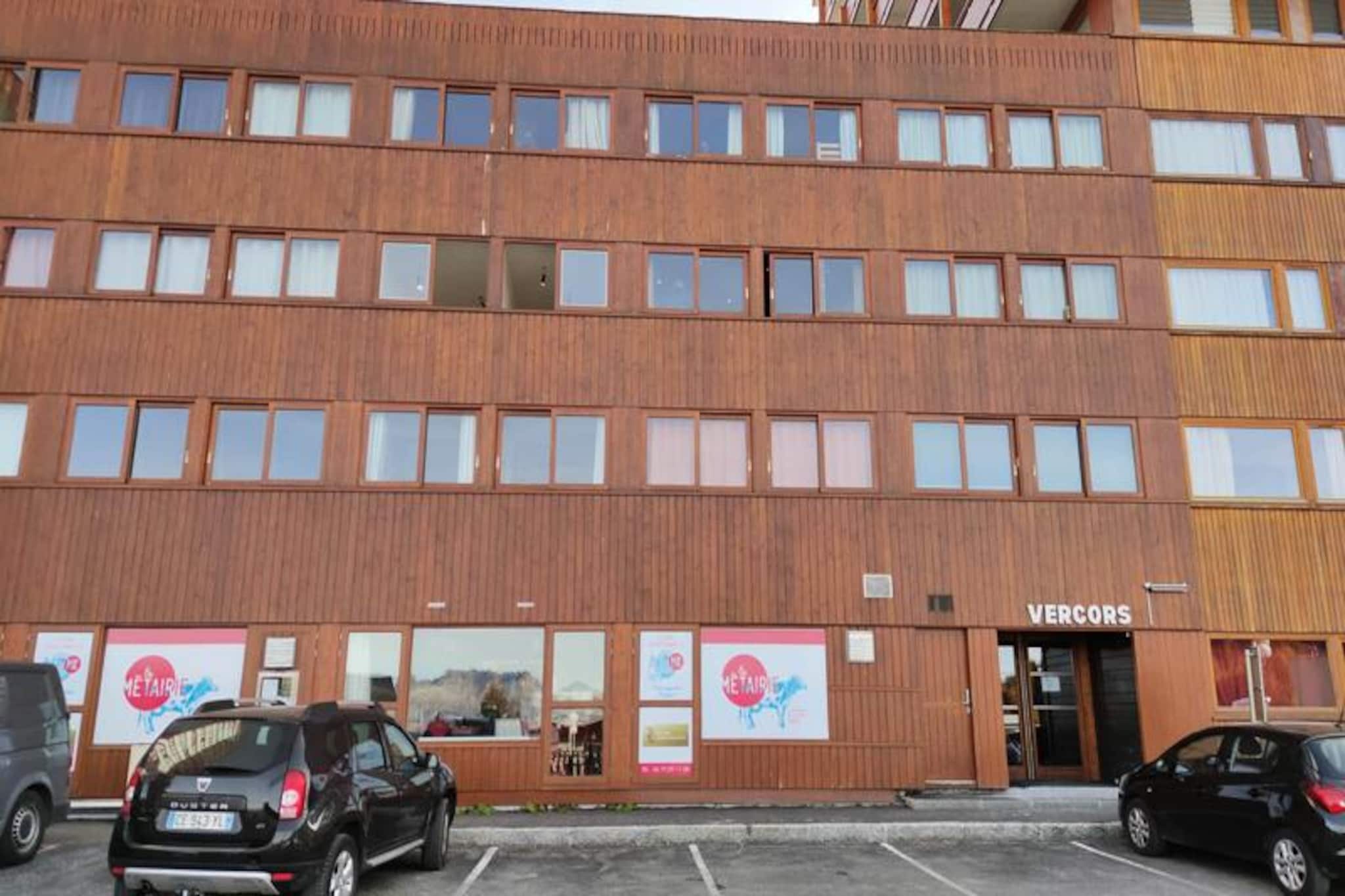 High above the enchanting slopes of La Plagne, this cozy studio in the Vercors residence offers an ideal retreat for ski enthusiasts and mountain lovers alike. With direct access to the snowfront and the vibrant Plagne Centre galleries, this property places you at the heart of alpine adventure. Whether you're here to carve through pristine pistes or simply soak in the serene mountain views, this residence promises a memorable stay in the French Alps.
Designed to accommodate up to four guests, the 27m² studio is thoughtfully arranged for both comfort and practicality. The living space, cleverly divided by a sliding panel, features two single beds and a set of bunk beds, ensuring restful nights after active days. The kitchen is fully equipped with modern amenities, including ceramic hobs, a refrigerator, a microwave, and even a Nespresso coffee maker for your morning brew. A flat-screen TV and cozy duvets add to the inviting atmosphere, while the bathroom provides a bathtub and all essential facilities. Please note that bed linen is not provided, and pets are not allowed.
Step outside and find yourself just moments away from ski lessons, daycare services, and the lively amenities of Plagne Centre. The convenience of a ski locker ensures your gear is always ready for the next adventure. In summer, the area transforms into a haven for hikers and nature enthusiasts, with breathtaking trails and panoramic vistas waiting to be explored. Whether you're visiting for winter thrills or summer serenity, this studio offers the perfect base for your alpine escape.