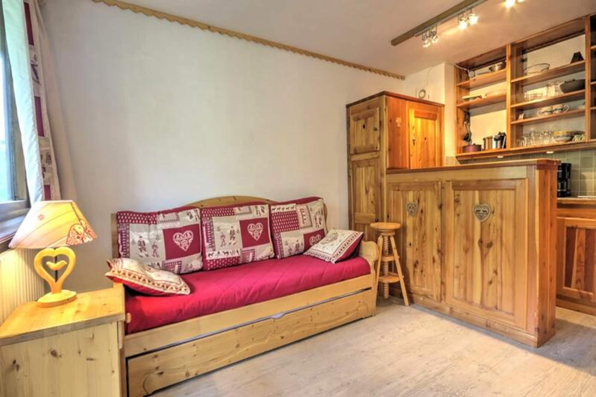 In the heart of the French Alps, where snow-dusted peaks meet the charm of alpine villages, this cozy studio in Plagne Centre offers the perfect retreat for couples seeking a mountain escape. Situated just 200 meters from the resort center and a mere 100 meters from the slopes, this residence ensures you’re always close to the action, whether it’s skiing down pristine runs or enjoying the vibrant après-ski atmosphere. The studio’s west-facing balcony invites you to unwind with views of the surrounding peaks as the sun sets over the mountains.
Thoughtfully designed for two, the 19m² studio blends comfort and practicality. Its warm mountain-style decor creates a welcoming ambiance, while the living area features a double trundle bed and a flat-screen TV for cozy evenings in. The kitchenette, equipped with a ceramic hob, refrigerator, combination microwave, and dishwasher, allows you to prepare meals with ease. A modern bathroom with a bathtub and toilet completes the space, ensuring a comfortable stay. Additional conveniences include duvets and a private ski locker, making your alpine adventures hassle-free.
Nestled at the exit of Plagne Centre near the Araucaria Hotel, the residence offers easy access to the slopes and nearby amenities. Explore the lively resort center, indulge in local Savoyard cuisine, or take advantage of the world-class Paradiski ski area. Whether you’re here for winter sports or summer hikes, this studio places you at the heart of it all. With its blend of location, comfort, and charm, it’s an ideal choice for your next alpine getaway.