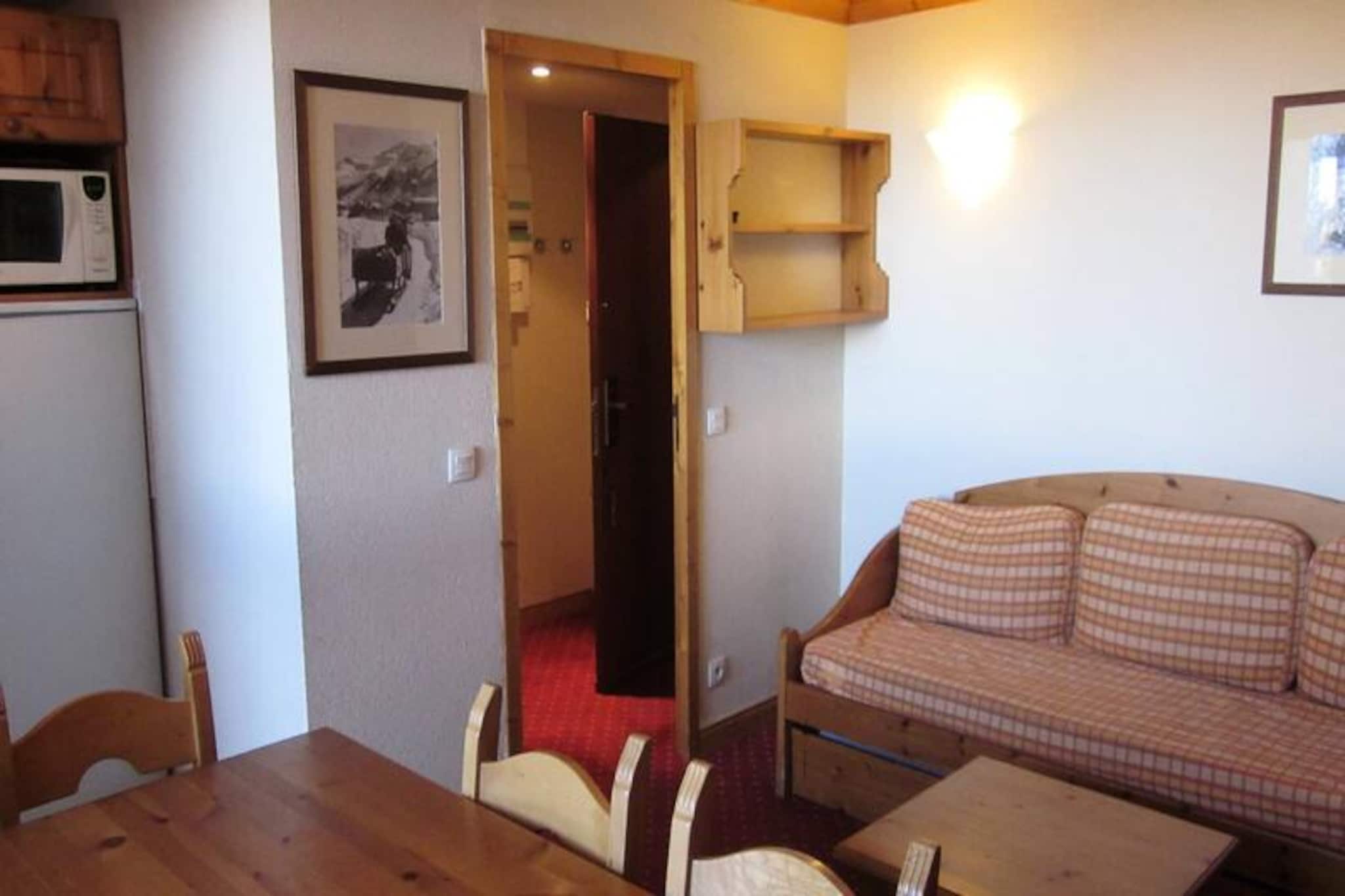 High above the Tarentaise Valley, this charming one-bedroom apartment in the Les Hameaux 1 Residence offers a perfect alpine retreat in the heart of Plagne Villages. At an altitude of 2,050 meters, the residence is ideally located for ski enthusiasts, with immediate access to the slopes, the ESF ski school, and the cable car connecting you to the wider La Plagne ski area. From the north-facing balcony, soak in the crisp mountain air and enjoy serene views of the snowy landscape, making it an ideal spot for both winter and summer getaways.
Inside, the 39m² apartment comfortably accommodates up to six guests. The living room features a cozy sofa bed and trundle bed, perfect for relaxing after a day on the slopes. The open-plan kitchen is equipped with all the essentials, including a mini oven, microwave, ceramic hob, and refrigerator, making it easy to prepare hearty meals. The bedroom offers flexible sleeping arrangements with two single beds that can be joined into a double, while a separate sleeping area with a bunk bed ensures comfort for families or groups. A bathroom and separate toilet add convenience to your stay, and the residence includes two ski lockers for your equipment.
Plagne Villages is a family-friendly resort with a lively atmosphere and excellent amenities. The free inter-resort shuttle makes it easy to explore nearby Plagne Soleil, while the cable car provides quick access to Plagne-Centre's shops, restaurants, and après-ski activities. In summer, the area transforms into a paradise for hikers and mountain bikers, with trails that wind through breathtaking alpine scenery.
Whether you're seeking thrilling ski adventures or tranquil mountain escapes, this apartment offers the perfect base to create unforgettable memories in the French Alps.
