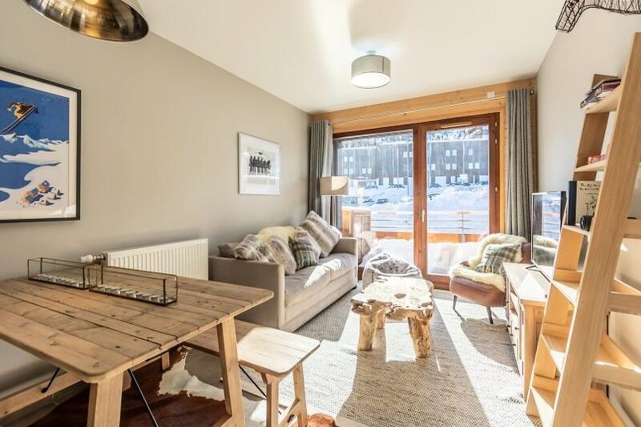 High above the Tarentaise Valley, where the crisp alpine air invigorates the senses, this modern mountain retreat in Plagne Centre offers a perfect blend of comfort and convenience. Located at 1970 meters, the residence places you at the heart of one of the Alps' most dynamic ski areas, with the iconic La Grande Rochette panorama just a short ascent away. Whether you're seeking thrilling winter adventures or serene summer escapes, this property promises unforgettable moments in the French Alps.
Step inside this 54m² apartment and discover a thoughtfully designed space that caters to your every need. The bright living room, complete with a cozy sofa and television, opens onto a south-facing balcony where you can soak in the mountain views. The open-plan kitchen is fully equipped with modern appliances, including a refrigerator/freezer, dishwasher, washer-dryer, ceramic hob, oven, microwave, and Nespresso coffee maker, making meal preparation a breeze. The master bedroom features a plush double bed and an en-suite shower room, while the second bedroom offers two versatile single beds. With two bathrooms and a separate toilet, the layout ensures privacy and comfort for all guests. Additional amenities include a ski locker and private garage, ensuring a seamless stay.
Just 100 meters from the slopes and steps away from the resort's shopping mall, this residence is perfectly positioned for both convenience and adventure. Plagne Centre is a vibrant hub, offering a wide array of activities, services, and shops to enhance your stay. In winter, enjoy direct access to world-class skiing, while summer brings opportunities for hiking, biking, and exploring the breathtaking alpine landscape. The adjoining medical office adds an extra layer of reassurance, making this property an ideal choice for families and groups alike.
Whether you're drawn by the thrill of the slopes, the allure of alpine tranquility, or the charm of a well-equipped mountain retreat, this apartment in Plagne Centre is your gateway to an extraordinary holiday experience.