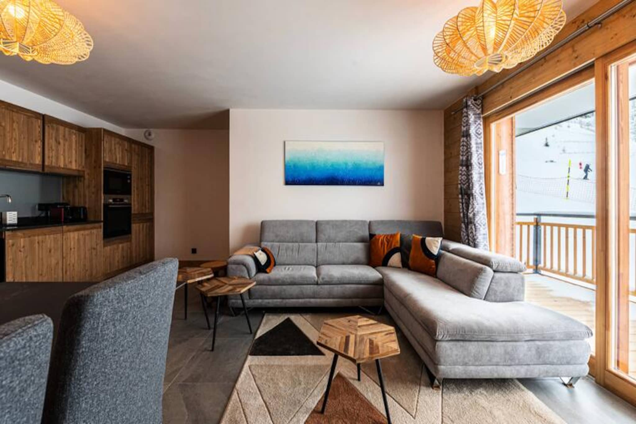 Imagine waking up to the breathtaking sight of Mont Blanc from the comfort of your luxurious apartment in the prestigious MANAKA residence, nestled in the heart of Plagne Centre. This high-end retreat offers the perfect blend of modern elegance and alpine charm, with its unbeatable location right at the foot of the slopes. Whether you're here for an action-packed ski holiday or a serene summer escape, this property promises an unforgettable stay in the French Alps. 
 
 Spanning 88m², this spacious ground-floor apartment is designed to accommodate up to eight guests in absolute comfort. The bright and inviting living room features a plush corner sofa and a large television, creating the perfect space to unwind after a day of adventure. The fully equipped open-plan kitchen, complete with a wine cooler and Nespresso coffee maker, makes dining in a pleasure. The sleeping arrangements include a luxurious master suite with an en-suite shower and queen-size bed, a cozy children's room with bunk beds, and a versatile twin room. Additional amenities such as a washer/dryer, ski locker, and private parking ensure a hassle-free experience.
 
 Step outside, and you'll find yourself in the heart of Plagne Centre, with ski lifts, shops, and restaurants just moments away. In winter, the slopes beckon for thrilling descents, while summer brings opportunities for hiking, mountain biking, and soaking in the alpine beauty. The panoramic views of Mont Blanc from your balcony provide the perfect backdrop to your holiday, whether you're sipping your morning coffee or enjoying an evening glass of wine.
 
 With bed linens, towels, and end-of-stay cleaning included, this apartment offers a seamless and luxurious getaway. Make this your home base for exploring the wonders of the French Alps and creating memories that will last a lifetime.