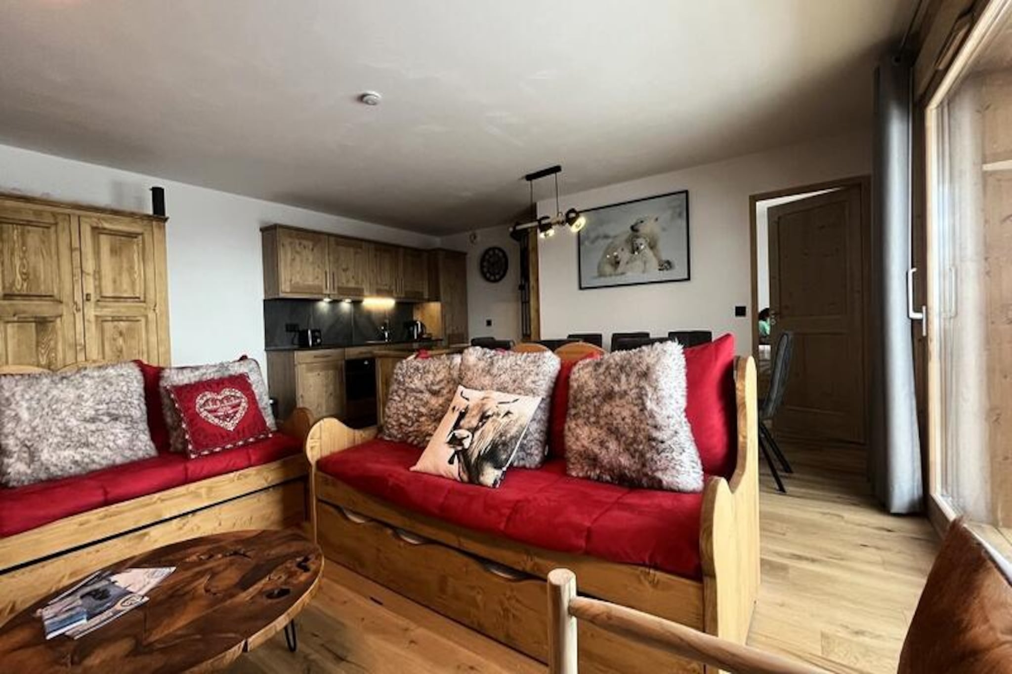 High above the picturesque slopes of La Plagne Centre, this luxurious apartment in the exclusive MANAKA residence offers an unparalleled alpine retreat. With breathtaking views of Mont Blanc from your private balcony, every moment here is infused with the magic of the French Alps. Whether you're sipping coffee at sunrise or unwinding after a day on the slopes, this is a place where comfort meets natural beauty. 
 
 Spanning 84m², the apartment is designed to accommodate up to six guests in style. The spacious living room, featuring two plush sofas and a flat-screen TV, opens onto a balcony that frames the majestic mountain vistas. The open-plan kitchen is fully equipped with modern appliances, including a refrigerator, ceramic hob, microwave, oven, and dishwasher, making it perfect for preparing hearty meals after a day of adventure. The sleeping arrangements include a master suite with a private shower room and toilet, a cozy children’s room with two single beds, and a versatile third bedroom where the twin beds can be combined. Additional conveniences such as a washer/dryer, separate toilet, and Wi-Fi ensure a seamless stay. 
 
 Situated at the foot of the slopes, this apartment offers ski-in/ski-out access, making it a dream for winter sports enthusiasts. Two private parking spaces and a ski locker add to the convenience. While the residence’s swimming pool is not included, the vibrant village of La Plagne Centre is at your doorstep, offering shops, restaurants, and après-ski activities. In summer, the area transforms into a haven for hikers and mountain bikers, with trails that lead to stunning alpine landscapes. 
 
 With its premium amenities, prime location, and unforgettable views, this apartment is the perfect choice for families or friends seeking a sophisticated mountain escape. Let the charm of Mont Blanc and the allure of La Plagne create memories that will last a lifetime.
