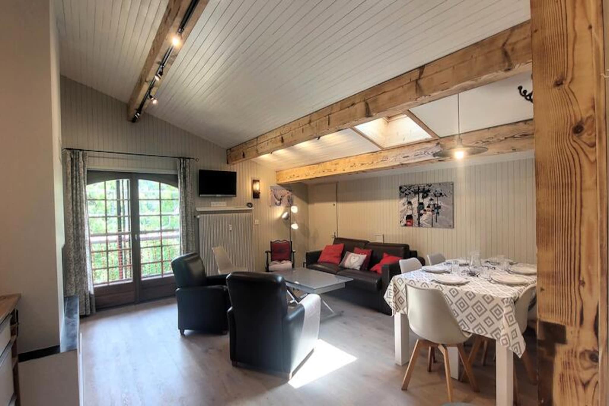 In the heart of the French Alps, this stunning penthouse offers a luxurious retreat with breathtaking views and a perfect blend of modern comfort and alpine charm. Situated just 600 meters from the village center, the residence is surrounded by a large landscaped garden, providing a peaceful and picturesque setting for your holiday. Whether you're visiting in winter or summer, this southwest-facing property ensures you enjoy the best of the region's natural beauty and sunlight throughout the day.
The penthouse, located on the third floor with elevator access, is designed to accommodate up to six guests. Its spacious and bright living area features a fully equipped kitchen, a cozy dining space, and a lounge with a TV and fireplace, perfect for relaxing after a day of adventure. Three beautifully appointed bedrooms, including a master suite with an en-suite shower room, offer restful nights under the alpine sky. Two balconies, facing east and west, provide the ideal spots to soak in the morning and evening sun while sipping your favorite drink. Modern amenities such as Wi-Fi, central heating, and a range of kitchen appliances ensure a seamless and comfortable stay.
The location is unbeatable, with the nearest ski slopes just 500 meters away and the French Ski School (ESF) within a short 650-meter walk. A shuttle stop only 50 meters from the residence makes it easy to explore the surrounding area. In addition, the village center, shops, and restaurants are all within walking distance, offering convenience and a taste of local culture. For summer visitors, the landscaped garden and nearby hiking trails provide endless opportunities for outdoor activities and relaxation.
This penthouse is more than just a place to stay; it’s an invitation to experience the magic of the Alps in style and comfort. With its thoughtful design, premium amenities, and prime location, it promises an unforgettable holiday for families, couples, or friends seeking a serene yet adventurous escape.