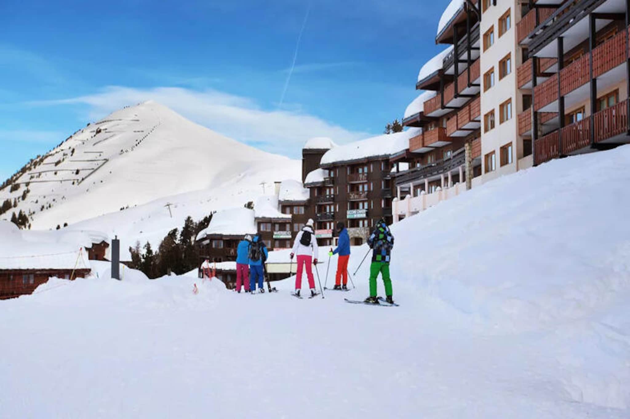 High above the Tarentaise Valley, in the heart of the Belle Plagne resort, this charming apartment offers a cozy retreat for your alpine adventures. At an altitude of 2,050 meters, Belle Plagne is a pedestrian-friendly haven surrounded by breathtaking mountain views and direct access to the renowned Paradiski ski area. With 425 kilometers of slopes and 70% of them above 2,000 meters, snow enthusiasts are guaranteed exceptional conditions throughout the season. Whether you're a seasoned skier or a beginner, this location promises unforgettable days on the slopes.
The apartment, located on the third floor of the La Licorne Residence, is thoughtfully designed for comfort and convenience. Spanning 28 square meters, it features a bright living room with a daybed and trundle bed, a cozy bedroom with a double bed, and an open-plan kitchen perfect for preparing hearty meals after a day in the snow. The southwest-facing balcony invites you to soak up the sun while enjoying panoramic views of the surrounding mountains and valley. A bathroom with a bathtub and a separate toilet complete the layout, ensuring a practical and relaxing stay.
Step outside, and you'll find yourself just 400 meters from the nearest ski lifts, making it easy to hit the slopes each morning. The fully pedestrianized Belle Plagne village offers a warm and friendly atmosphere with shops, restaurants, and après-ski options all within walking distance. During the summer months, the nearby Vanoise National Park transforms the area into a paradise for hikers and nature lovers, with trails that wind through stunning alpine landscapes.
Whether you're visiting for the thrill of winter sports or the tranquility of summer hikes, this apartment in Belle Plagne is your gateway to the best of the French Alps. Create lasting memories in a destination that combines natural beauty, modern amenities, and a welcoming alpine spirit.