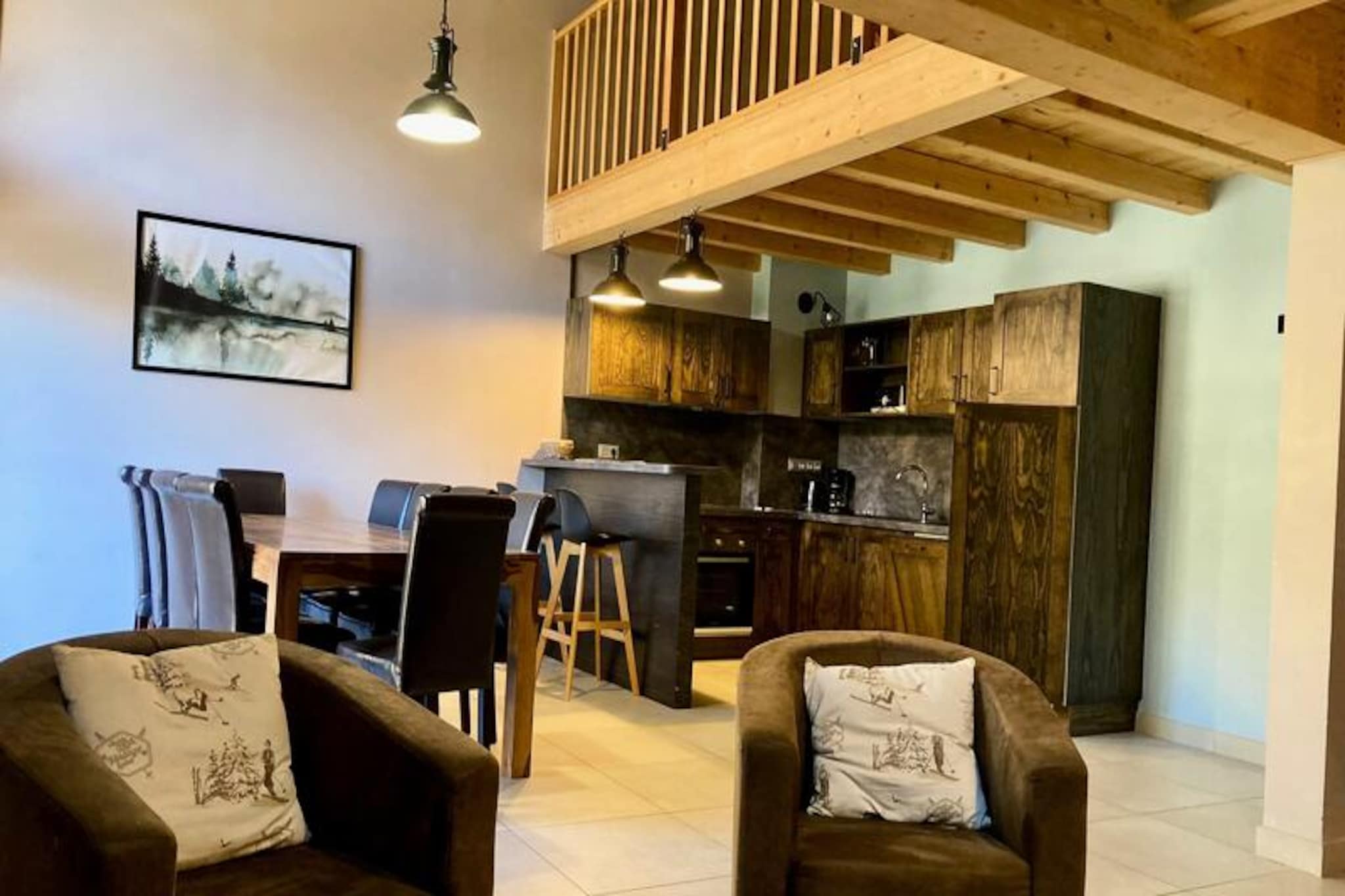 In the vibrant heart of Les Deux Alpes, this stunning duplex apartment offers a perfect blend of alpine charm and modern comfort. Just 250 meters from the ski slopes, it provides effortless access to the lifts while being steps away from the lively Avenue de la Muzelle, filled with shops, restaurants, and après-ski delights. Whether you're here for winter sports or summer mountain escapes, this residence places you at the center of it all. 
 
 Spanning 103m², the apartment is designed to accommodate up to 10 guests, making it ideal for families or groups. The main floor features an en-suite bedroom with a double bed and private shower, a cozy bunk bedroom perfect for kids, and a spacious living area with high ceilings. The mezzanine, open to the living room, adds two single beds, while an additional upstairs bedroom offers another double bed. The living room, complete with a convertible sofa, armchairs, and a flat-screen TV, opens onto a large west-facing balcony. Here, you can unwind in lounge chairs while soaking in breathtaking mountain views. The fully equipped kitchen includes a ceramic hob, oven, microwave, dishwasher, and more, ensuring all the comforts of home.
 
 Beyond the apartment, Les Deux Alpes invites you to explore its world-class ski slopes, vibrant nightlife, and summer hiking trails. With its prime location, you'll enjoy easy access to ski lifts, local markets, and charming eateries. Whether you're seeking thrilling adventures or tranquil alpine moments, this residence promises an unforgettable stay in the French Alps.