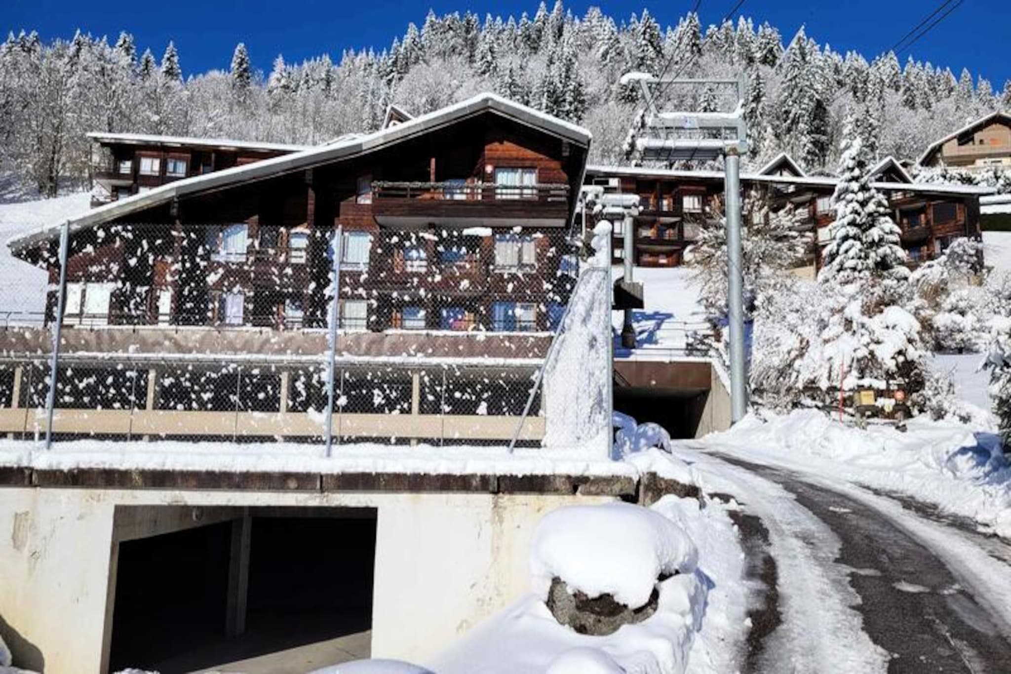 Apartment in Les Gets with Ski Slope Views