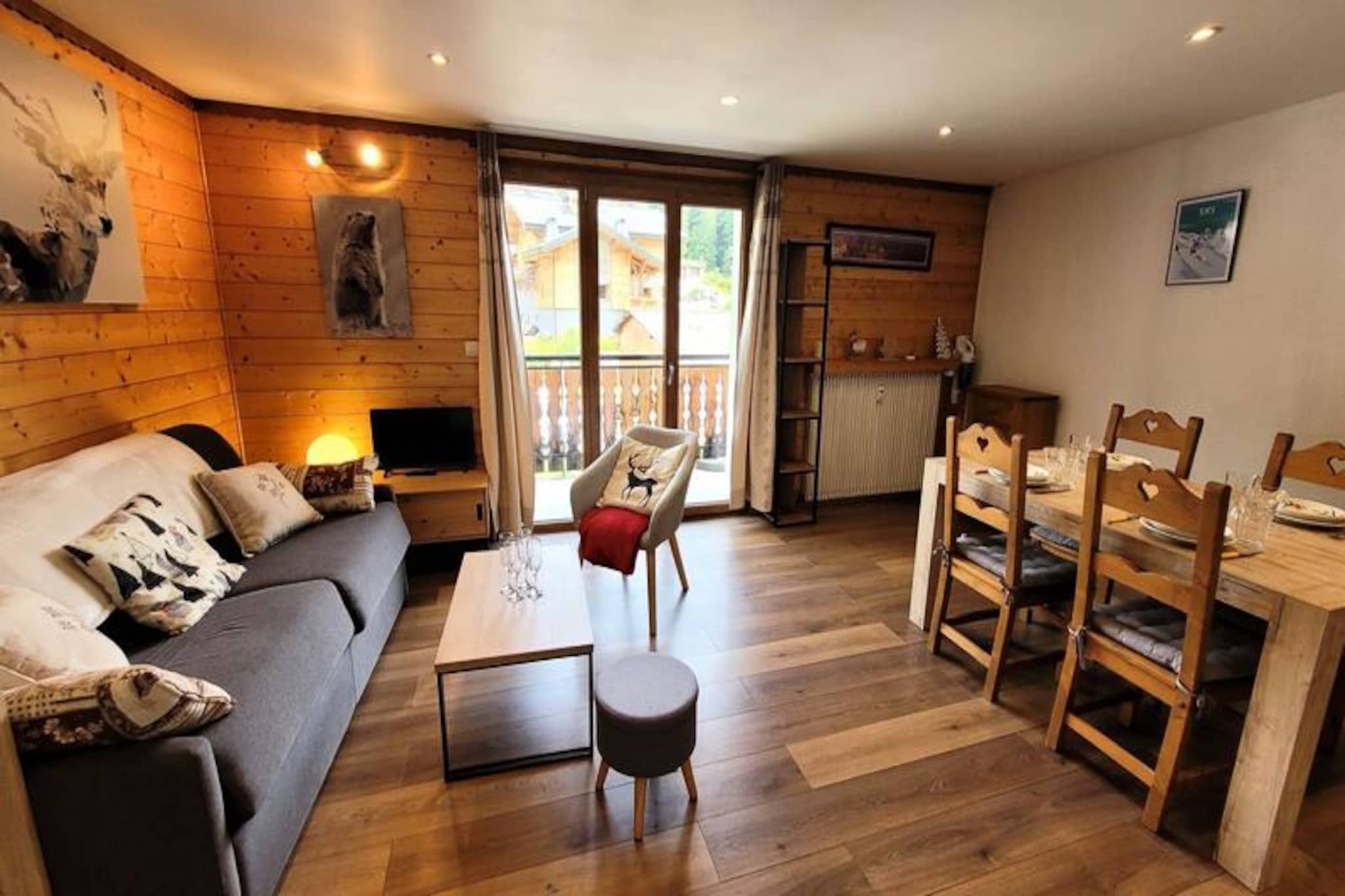 In the heart of the charming Old Village of Les Gets, this delightful apartment offers a perfect blend of alpine tradition and modern comfort. Just steps from local shops and a short walk to the Mont Chery ski slopes, this residence places you in an ideal location for exploring the beauty of the French Alps. The Chavannes ski area and the bustling resort center are only five minutes away, making it a convenient base for both adventure and relaxation. \n\nSituated on the second floor of a quaint, typical alpine residence, this recently renovated apartment exudes warmth and practicality. The bright living space is complemented by a large, fully equipped modern kitchen, perfect for preparing hearty meals after a day on the slopes. The east-facing balcony invites you to enjoy serene mornings with gentle sunshine and picturesque views. Designed to accommodate up to four guests, the apartment features a cozy entrance hall with a cabin bunk bed, a comfortable living room with a sofa bed, and a functional bathroom with a towel dryer for added convenience.\n\nWith ski slopes just 200 meters away and the French Ski School within easy reach, this location is a haven for winter sports enthusiasts. In summer, the village transforms into a vibrant hub for hiking, mountain biking, and other outdoor activities. The nearby shuttle stop ensures easy access to explore the surrounding areas, while the proximity to shops and restaurants means you’ll have everything you need at your fingertips.\n\nWhether you’re seeking a peaceful retreat or an active holiday, this cozy apartment in Les Gets promises an unforgettable alpine experience. With its charming ambiance, excellent location, and thoughtful amenities, it’s the perfect choice for couples, small families, or friends looking to immerse themselves in the magic of the mountains.