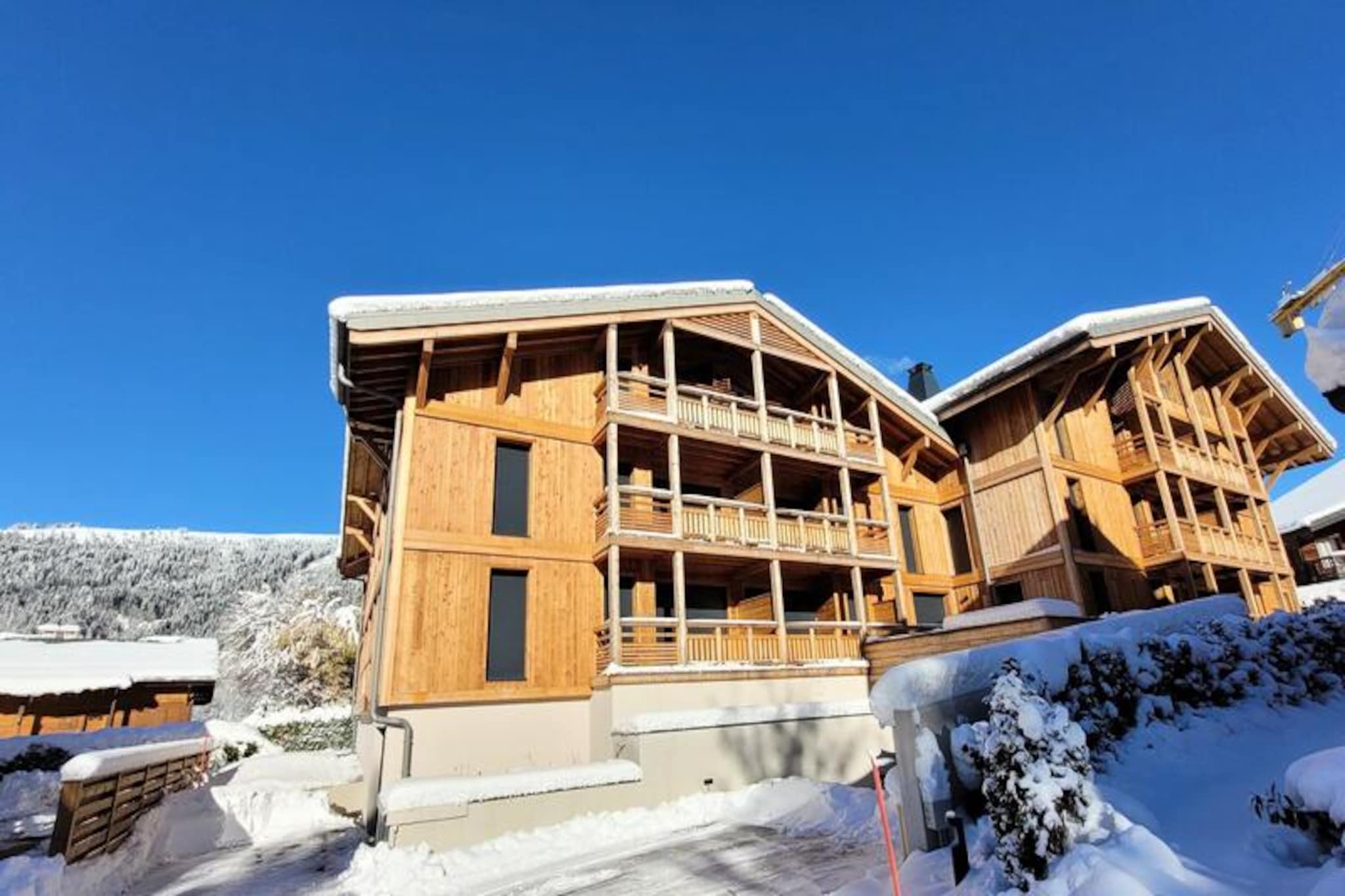 In the serene La Turche area, where tranquility meets alpine charm, this elegant apartment offers a perfect retreat for those seeking comfort and convenience in the heart of the French Alps. Imagine waking up to unobstructed views of Mont Chery from your private balcony, breathing in the crisp mountain air, and planning your day of adventure. Whether skiing down the nearby Perrieres slopes or exploring the picturesque surroundings, this residence ensures a seamless and memorable stay. The free shuttle, just 80 meters away, makes accessing the slopes and local attractions effortless, while the peaceful ambiance of the area invites relaxation after an active day. \n\nRated 4 stars, the apartment is thoughtfully designed to combine modernity and alpine charm. It features two en-suite bedrooms, offering privacy and comfort for up to four guests. The west-facing living and dining area, with its fully equipped kitchen, opens onto the balcony, creating a warm and inviting space to unwind. From the wine cellar to the raclette machine, every detail has been considered to enhance your stay. Smart TV, Sonos sound system, and fiber optic Wi-Fi ensure entertainment and connectivity, while the boot dryer and ski storage add practicality for winter adventures. \n\nLa Turche’s location is ideal for discovering the region. The Perrieres slopes are just 300 meters away, and the lively center of Les Gets is only 2 kilometers from your doorstep. Nearby, you’ll find shops, restaurants, and the renowned ESF ski school, making it perfect for families and ski enthusiasts alike. In summer, the area transforms into a haven for hikers and cyclists, with trails that showcase the breathtaking alpine landscapes. \n\nWhether you’re here to carve through powdery slopes or bask in the summer sun, this apartment offers a harmonious blend of luxury, functionality, and alpine beauty, ensuring your holiday in Les Gets is nothing short of extraordinary.